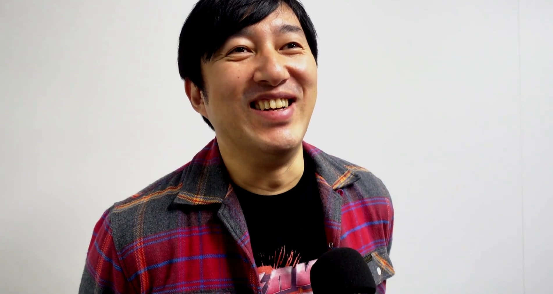Goichi Suda, red plaid shirt, black t-shirt, HD Desktop Wallpaper