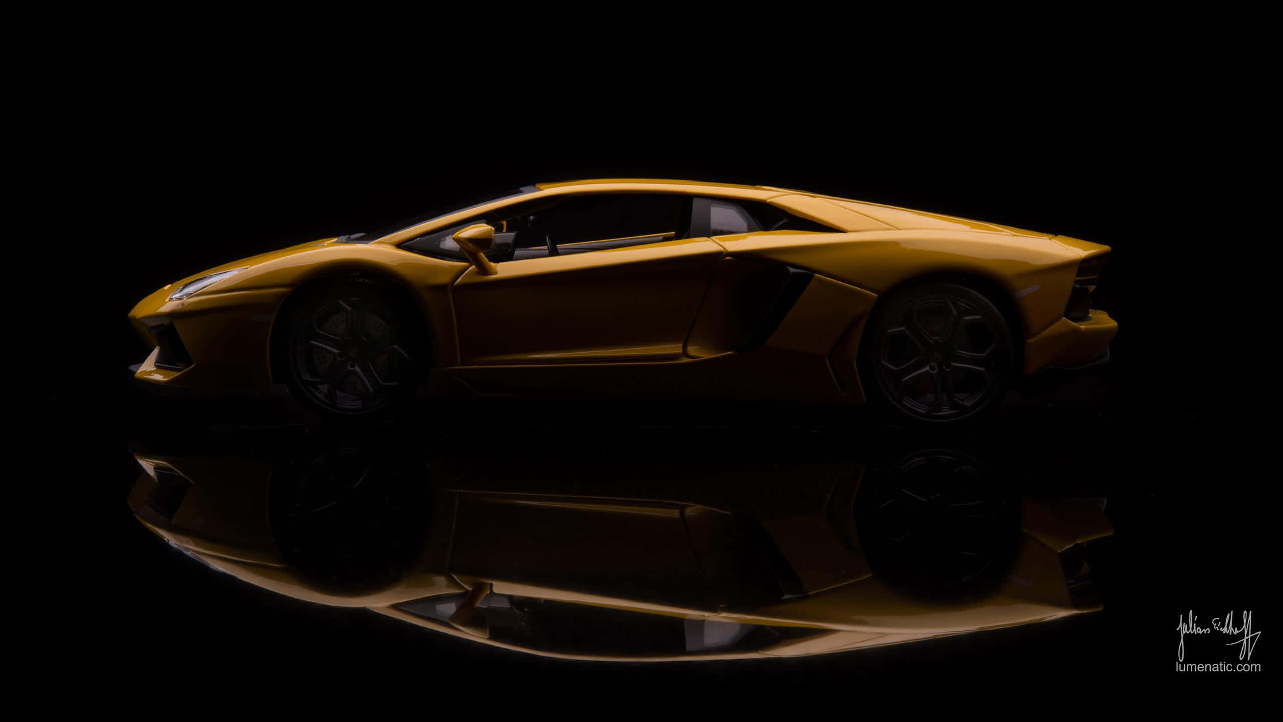 gold cars, sleek golden sports car, black background, 2K Desktop Wallpaper