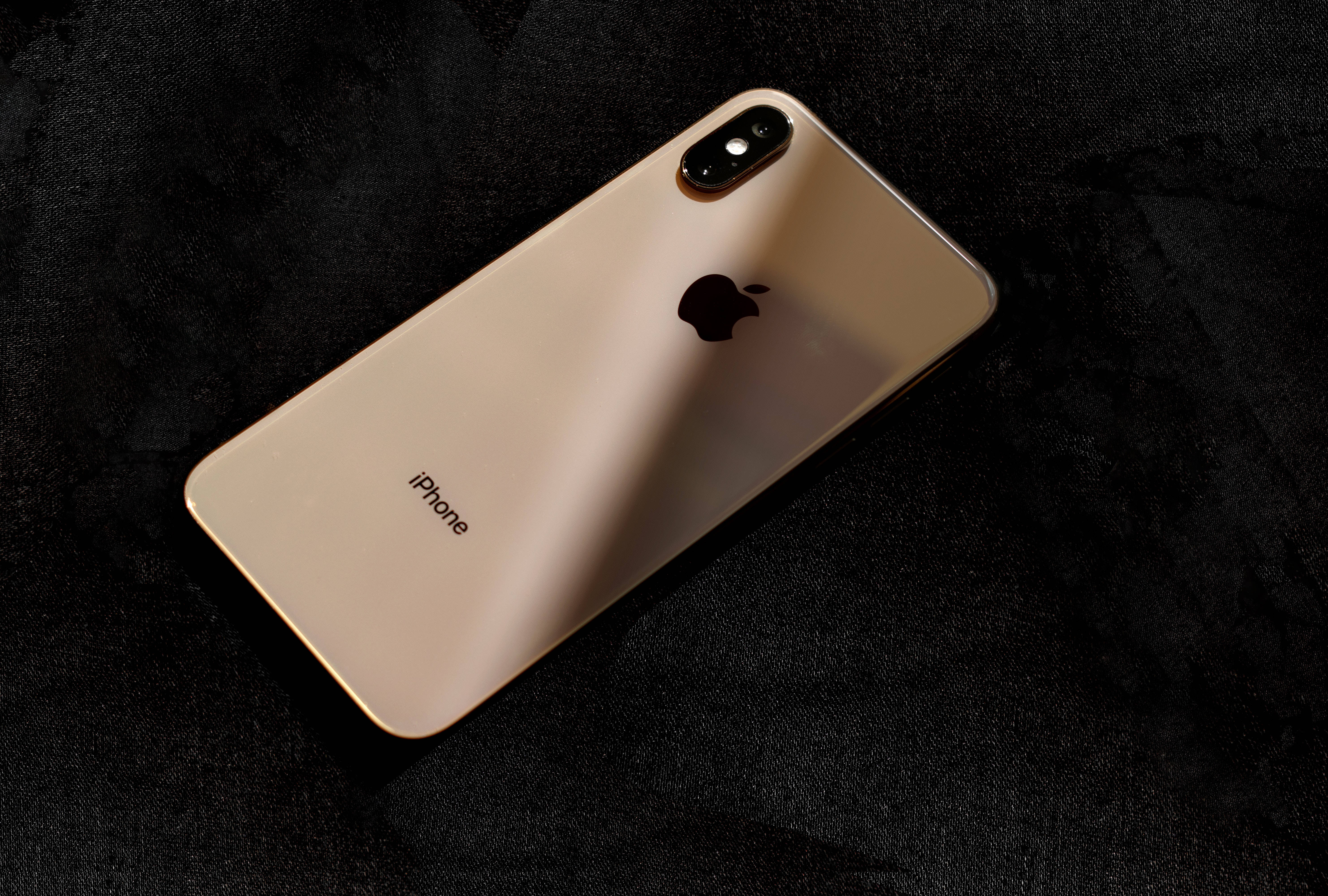 iPhone X, gold, black fabric, 5K Desktop Wallpaper