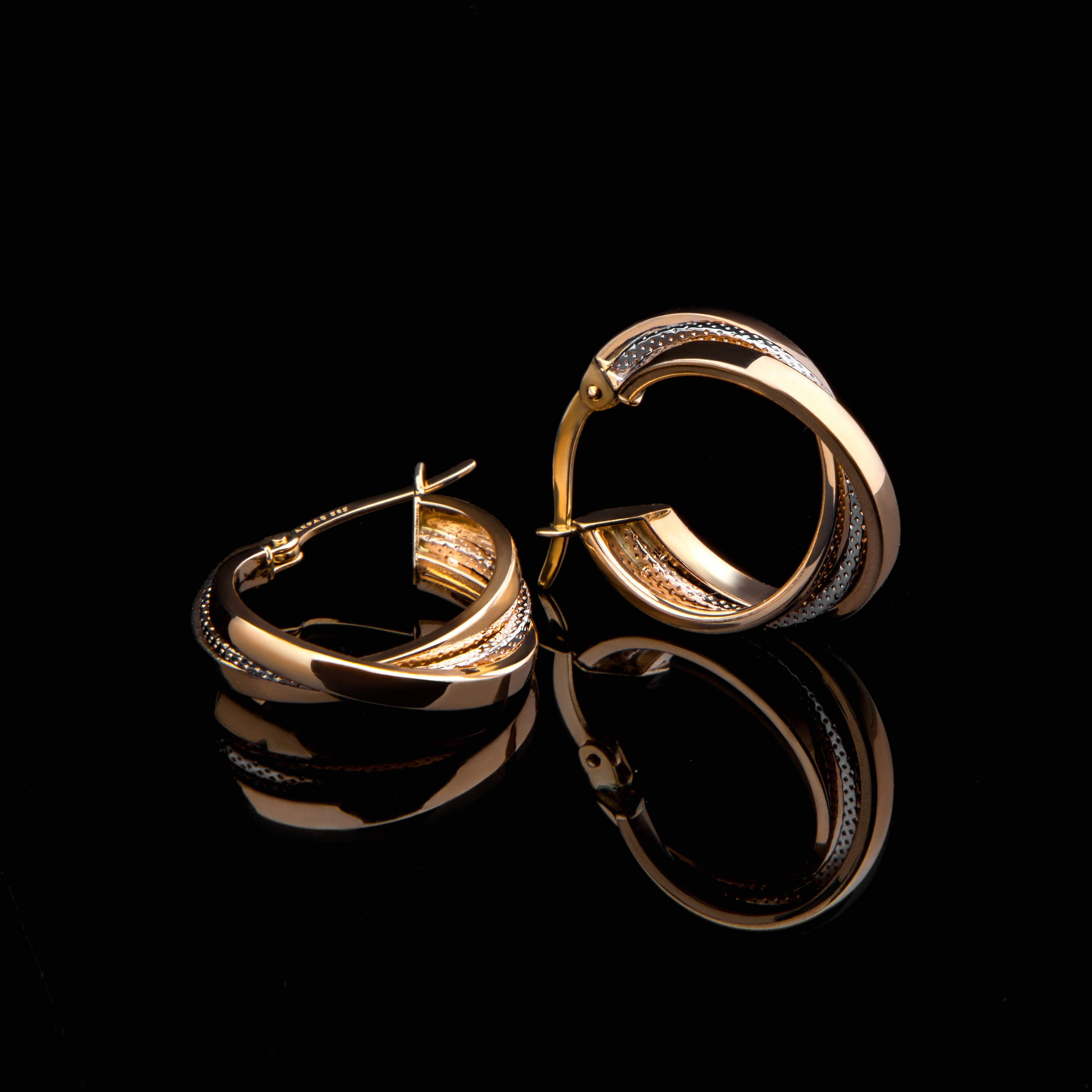 gold hoop earrings, diamond accents, reflective black surface, 2K Desktop Wallpaper