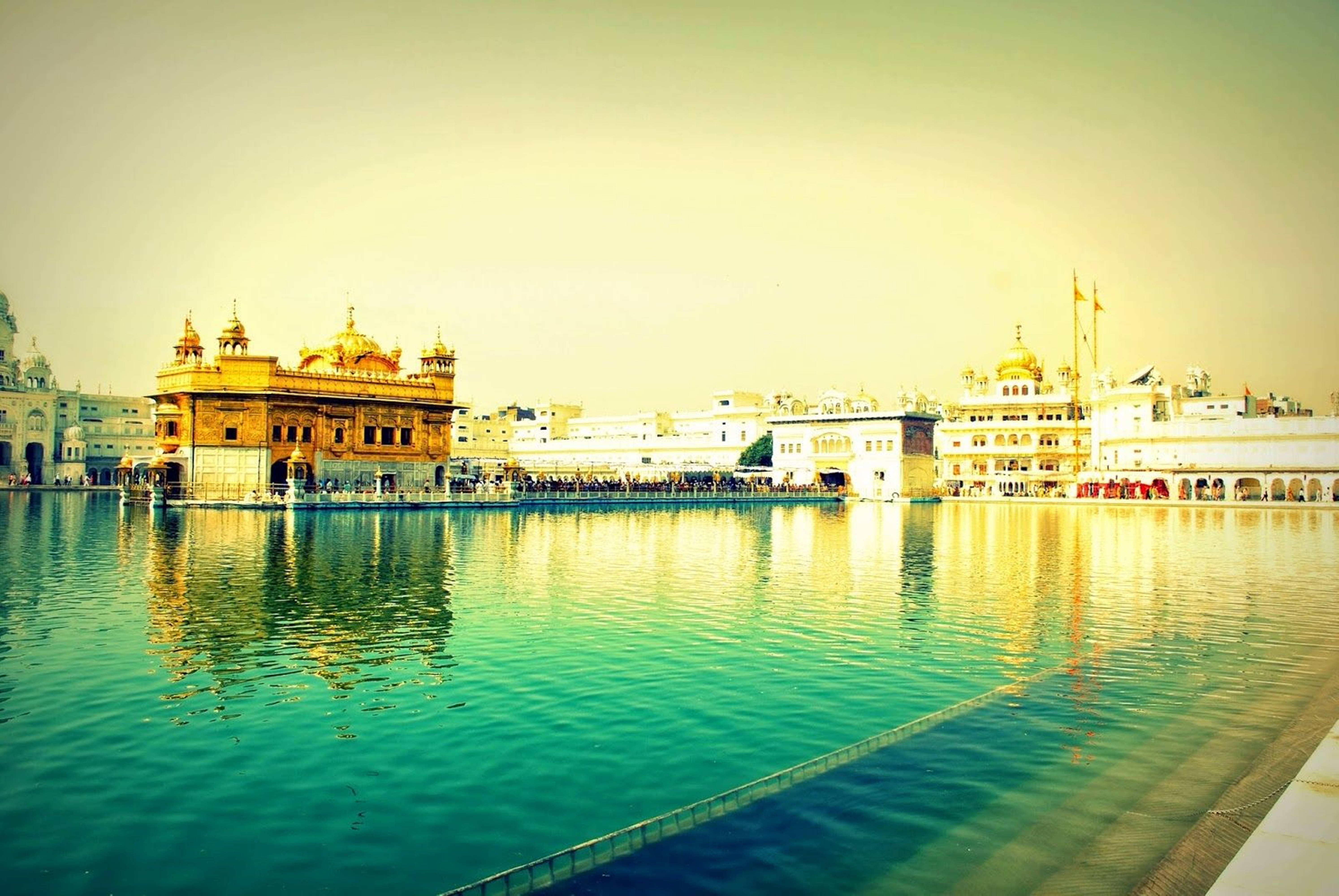 Golden Temple, turquoise waters, golden hour light, 5K Desktop Wallpaper