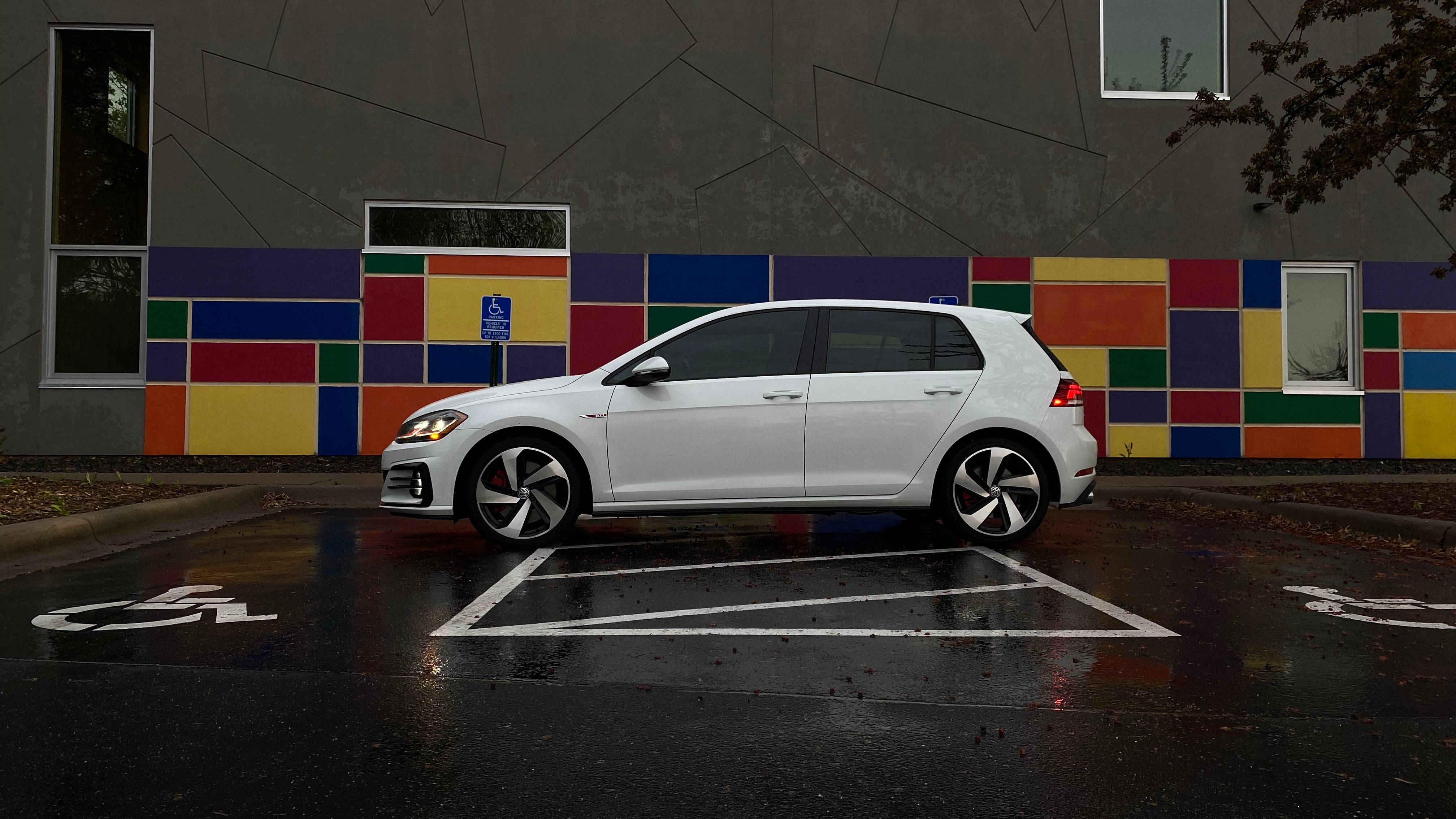 white golf gti, hatchback, wet parking space, 4K Desktop Wallpaper
