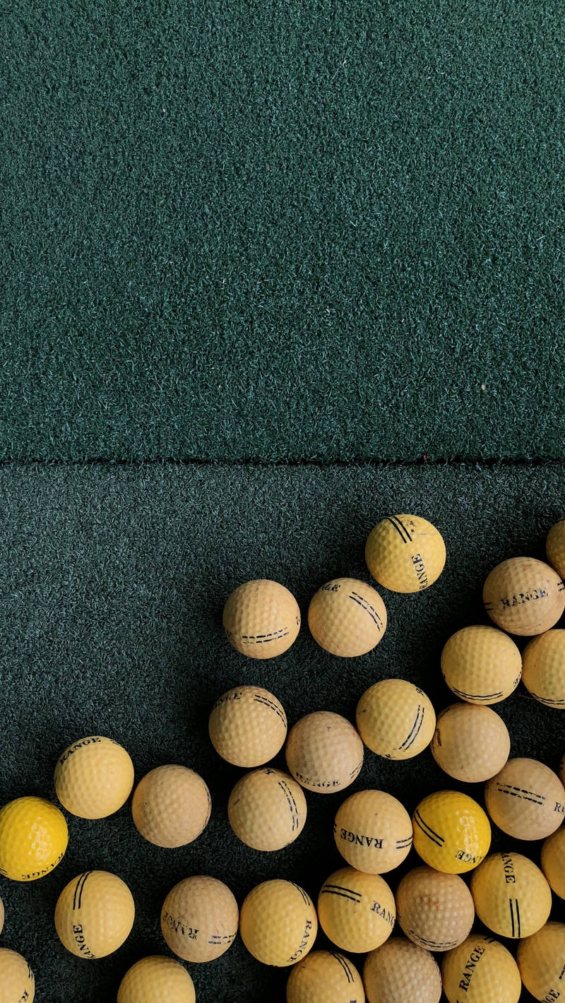 yellow golf balls, dark green artificial turf, iPhone, HD Phone Wallpaper
