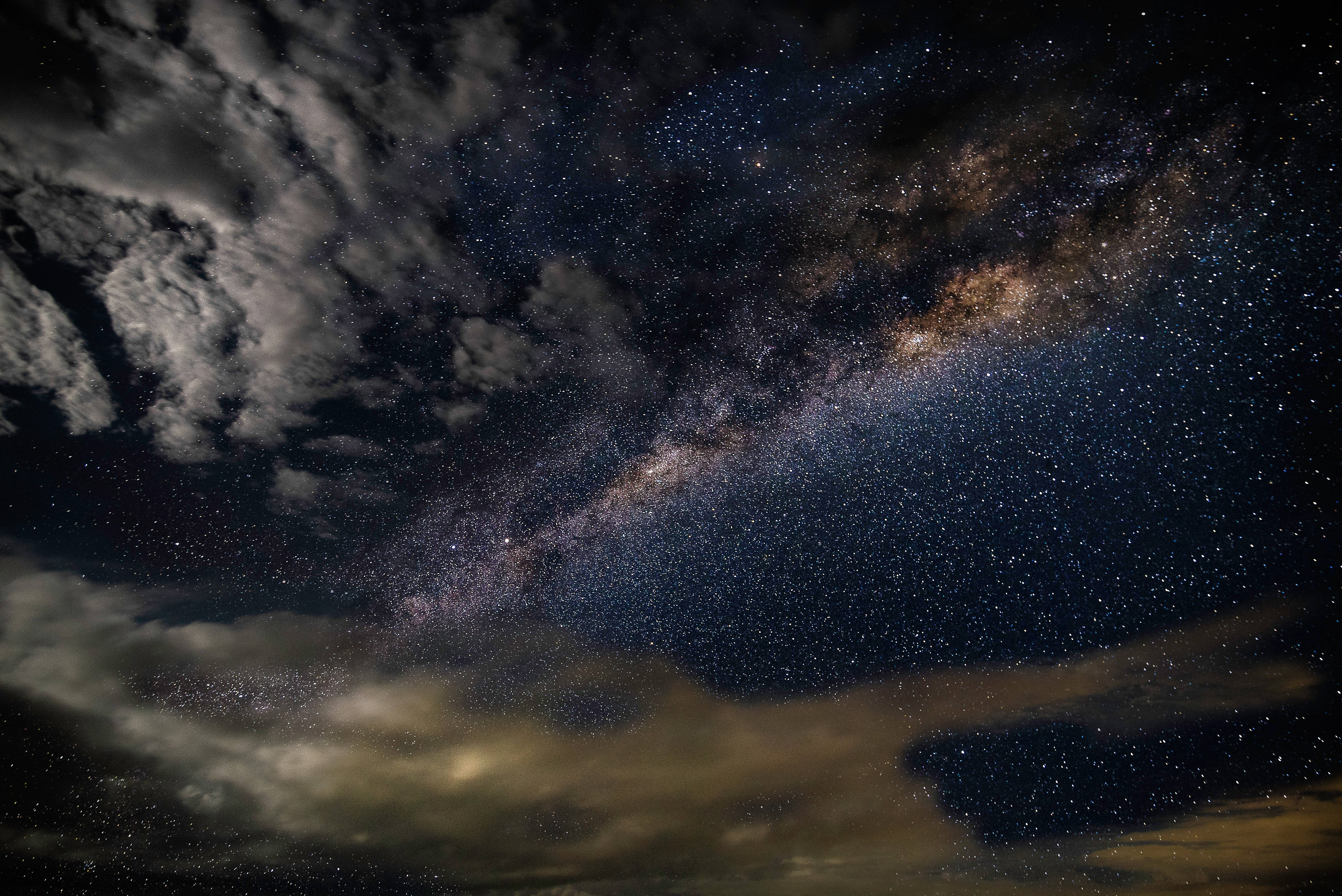 Milky Way galaxy, starry night sky, dramatic clouds, 5K Desktop Wallpaper