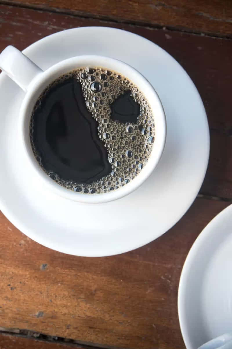 white ceramic cup, dark coffee, frothy bubbles, SD Phone Wallpaper