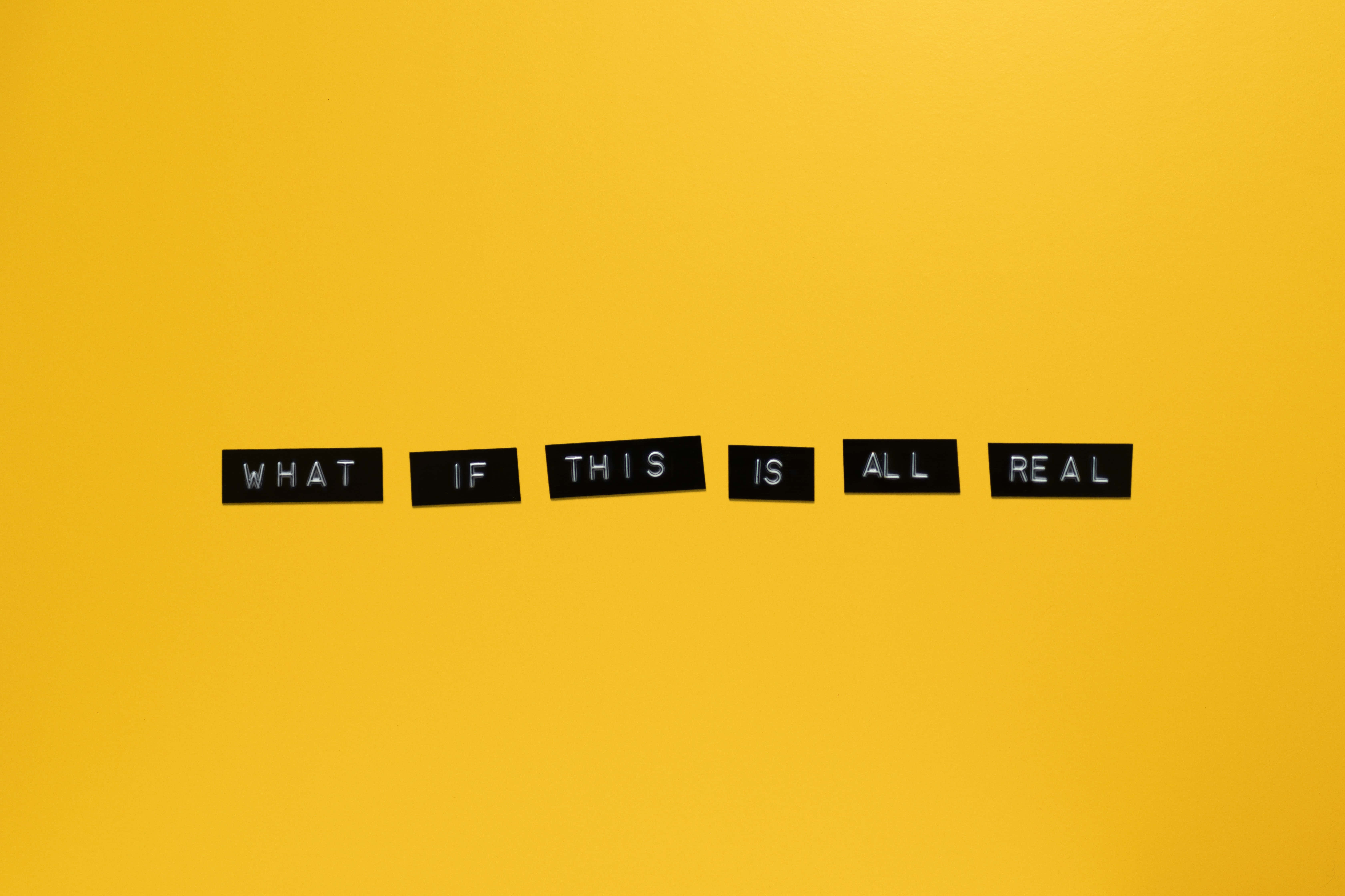 WHAT IF THIS IS ALL REAL, black letter tiles, vibrant yellow background, 5K Desktop Wallpaper