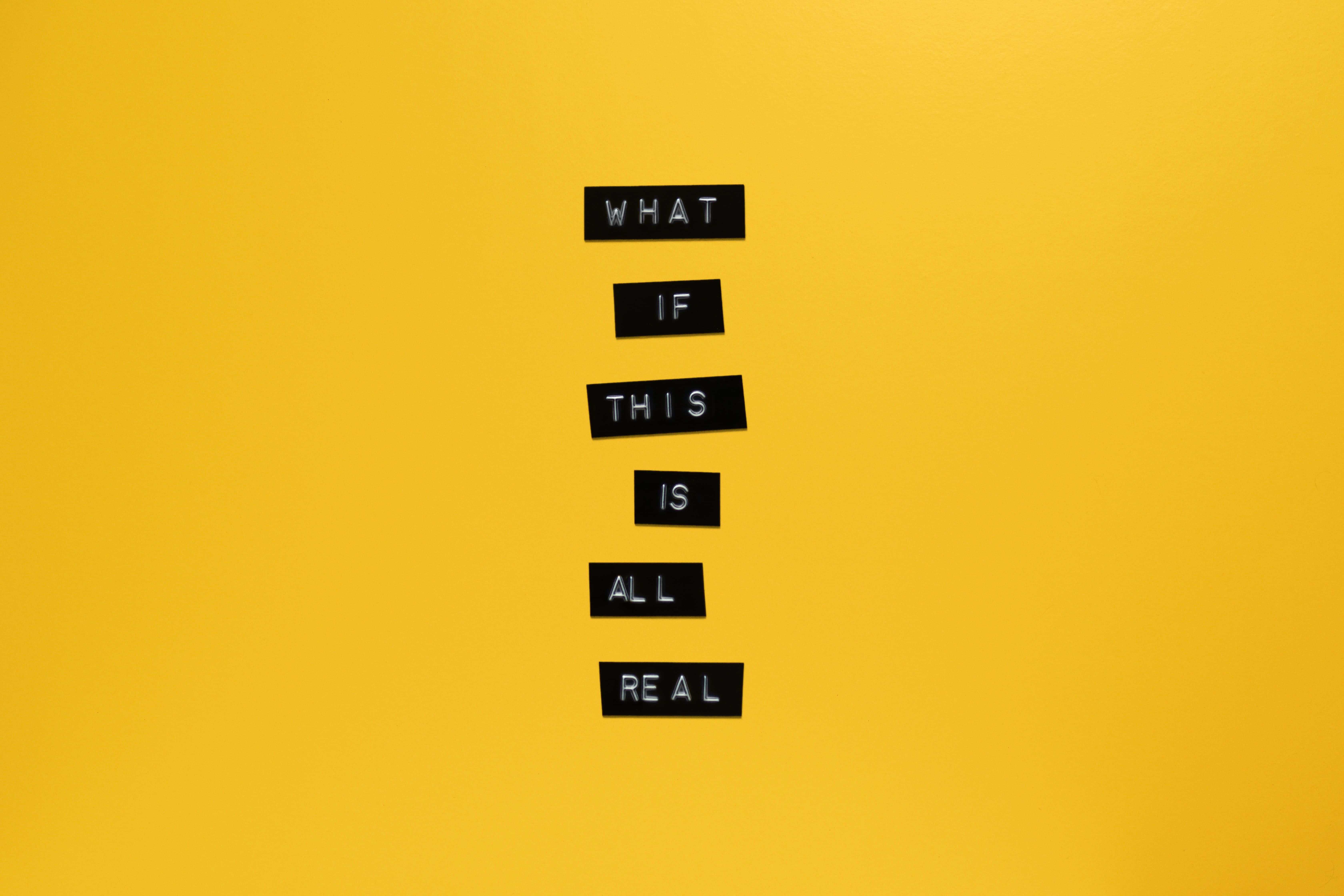 WHAT IF THIS IS ALL REAL, black letter tiles, vibrant yellow background, 5K Desktop Wallpaper