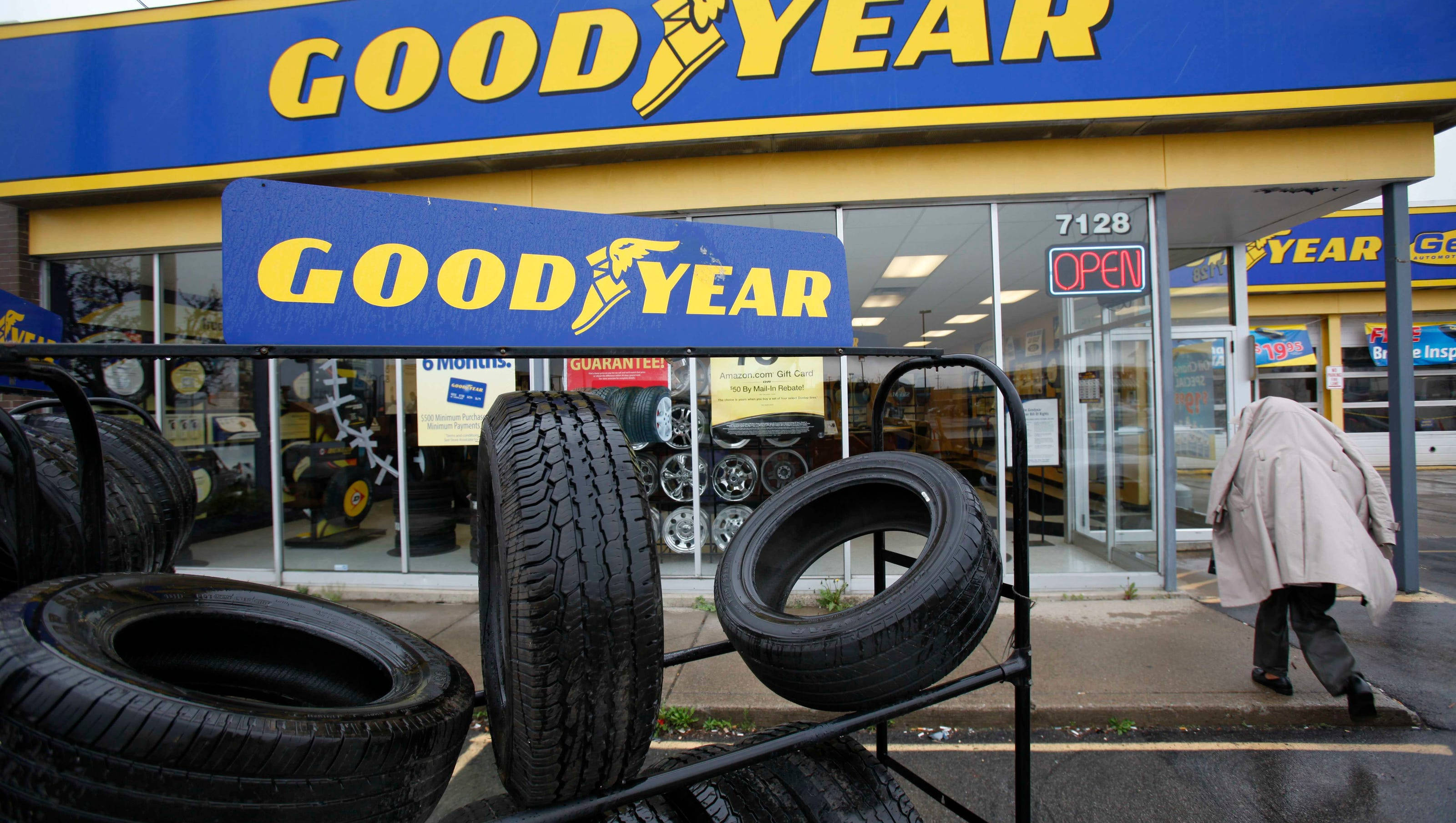 Goodyear, tire shop exterior, stacked tires, 2K Desktop Wallpaper