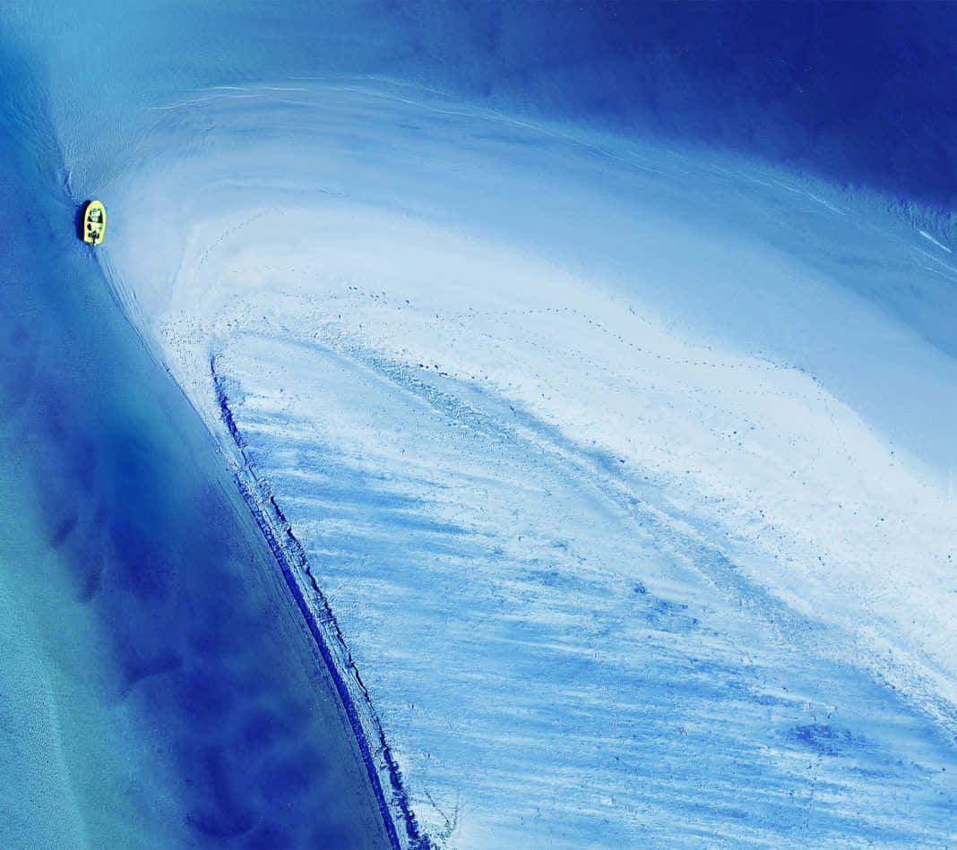 Google Pixel Water, yellow boat, deep blue water, SD Desktop Wallpaper