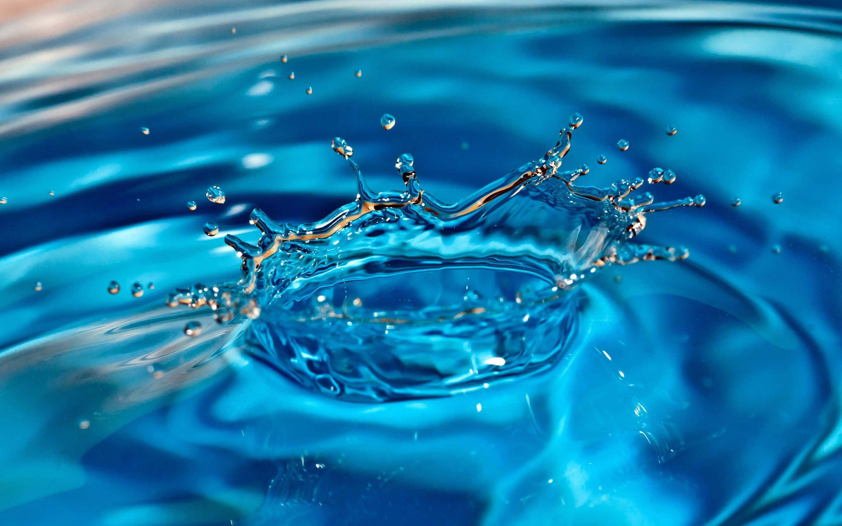 Google Pixel Water, vibrant blue, crystalline droplets, 2K Desktop Wallpaper