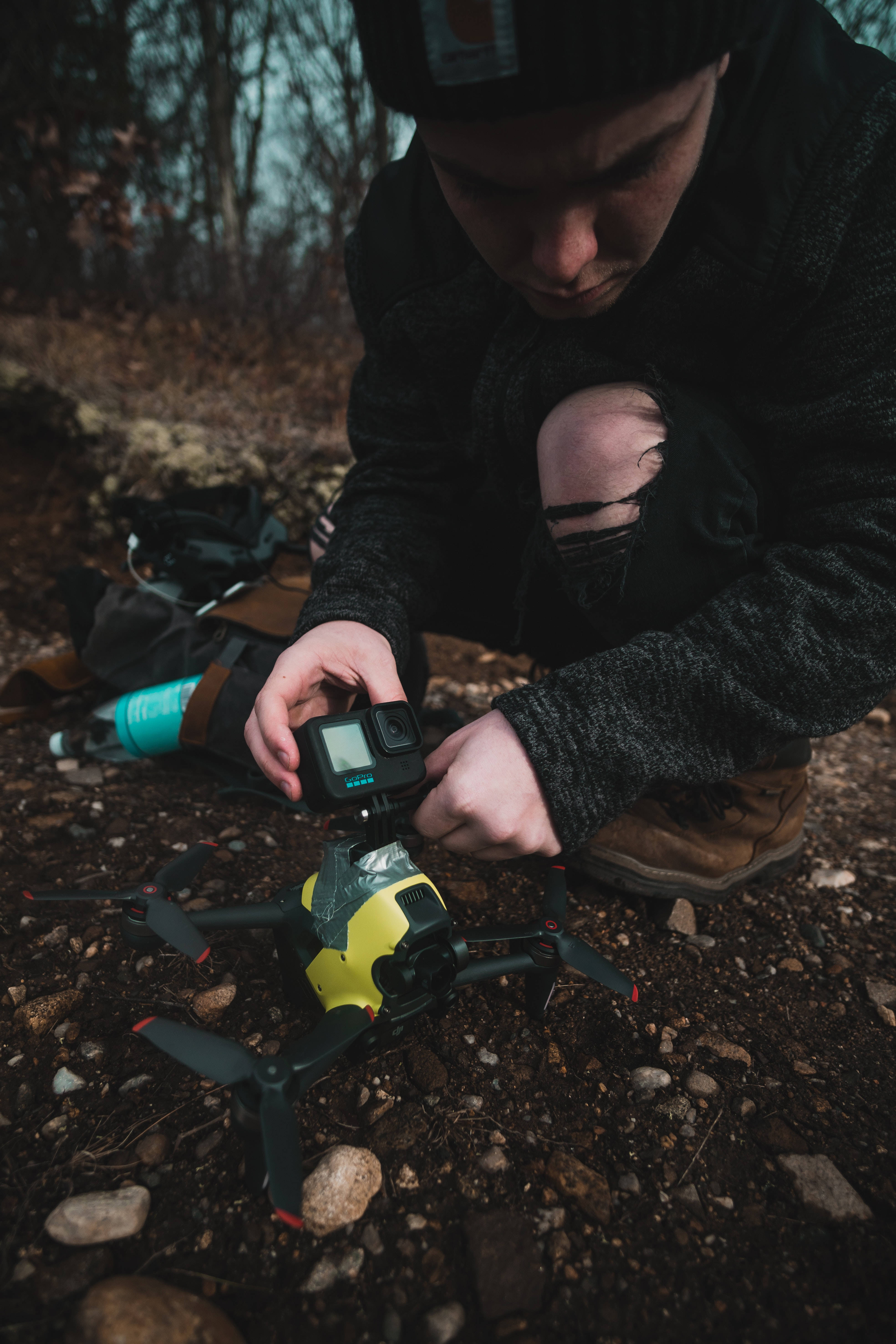 GoPro, yellow drone, forest clearing, 5K Phone Wallpaper