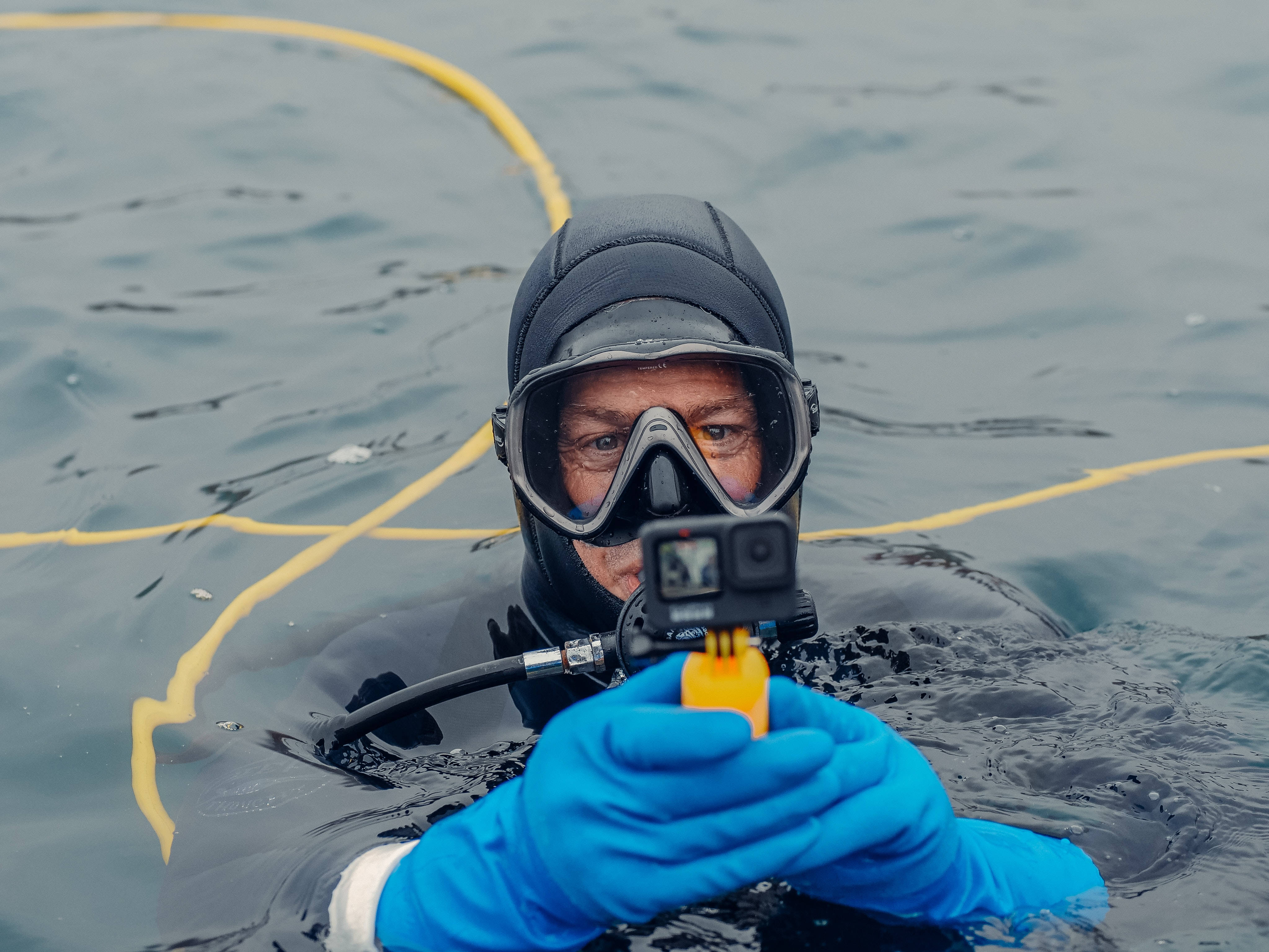 GoPro, black wetsuit, blue gloves, 4K Desktop Wallpaper