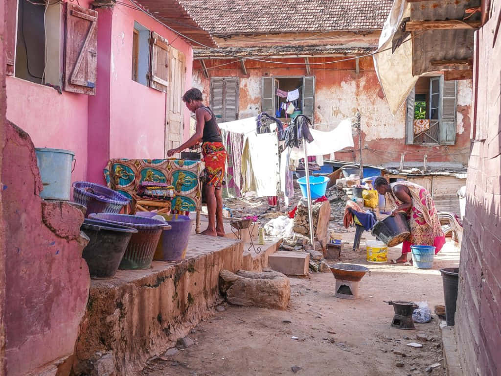 Goree, sunlit alleyway, weathered pink buildings, SD Desktop Wallpaper