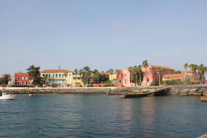 Goree Sea, white boat, pastel-colored houses, SD Desktop Wallpaper
