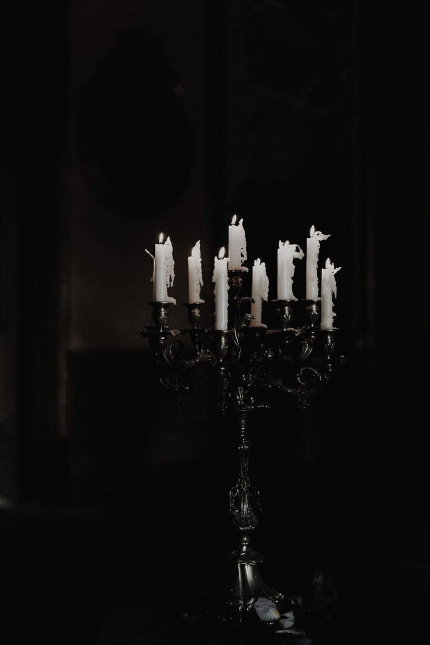 black candelabra, flickering white candles, dark, mysterious room, SD Phone Wallpaper