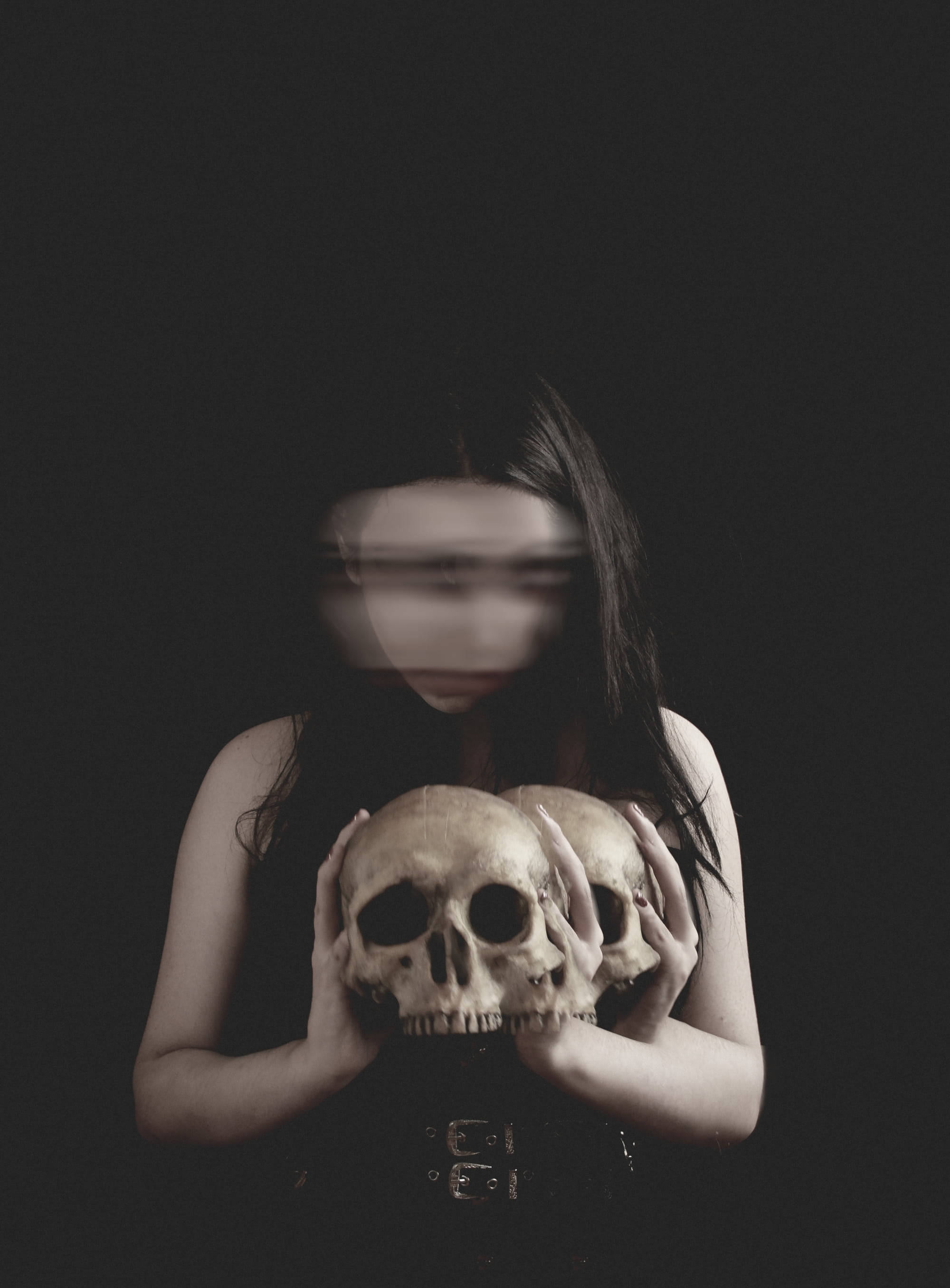 Motion Blur Goth Girl PFP, long dark hair, two skulls, 2K Phone Wallpaper