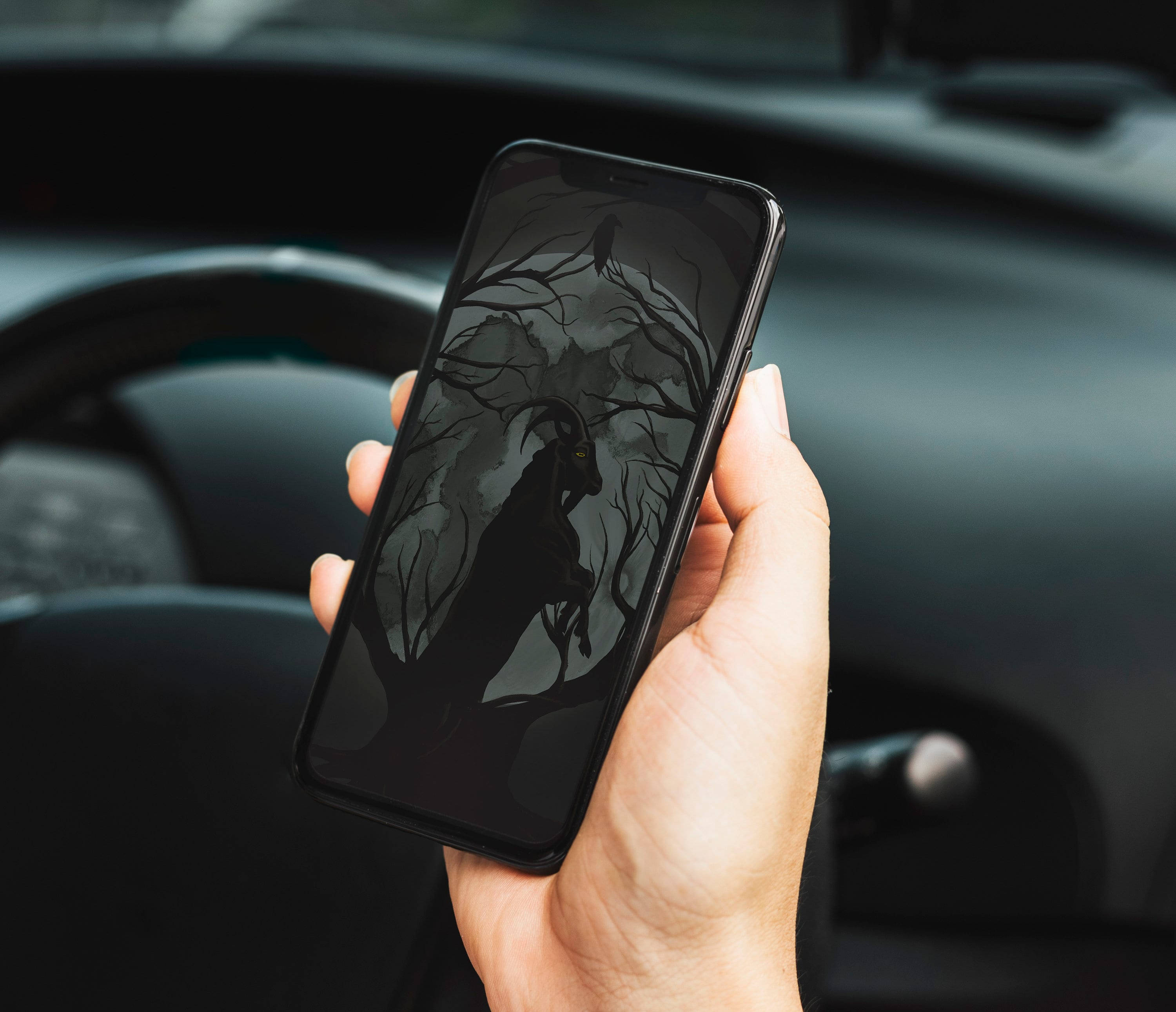 gothic phone, goat-headed figure, twisted trees, 2K Desktop Wallpaper