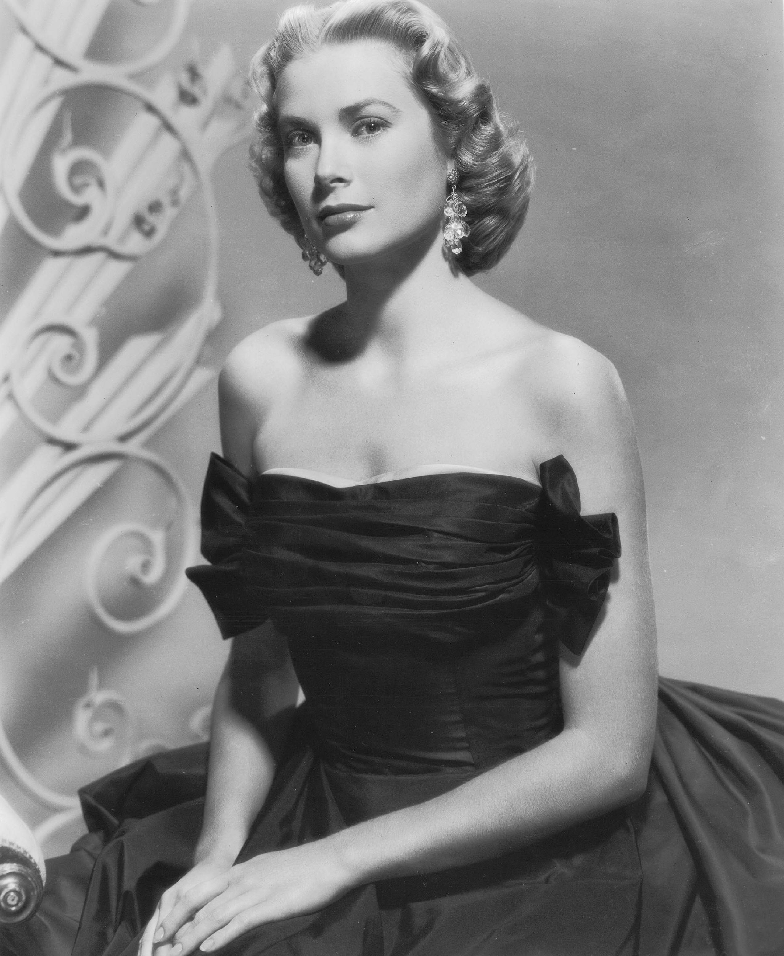 Grace Kelly, black off-shoulder gown, ornate backdrop, 2K Phone Wallpaper