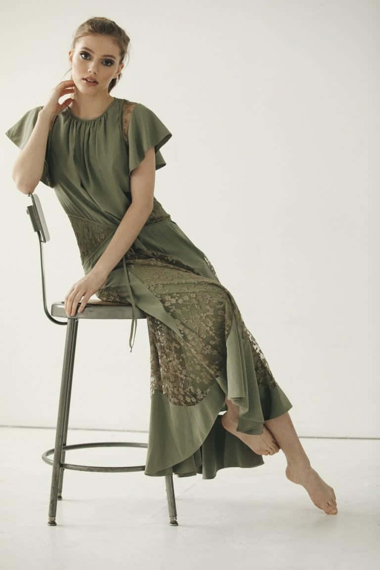 Grace Van Dien, olive green lace dress, metal stool, SD Phone Wallpaper