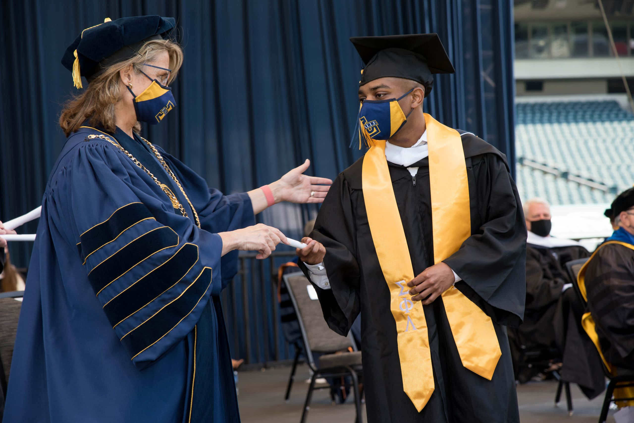 Graduation Ceremony, black cap and gown, gold stole, 2K Desktop Wallpaper