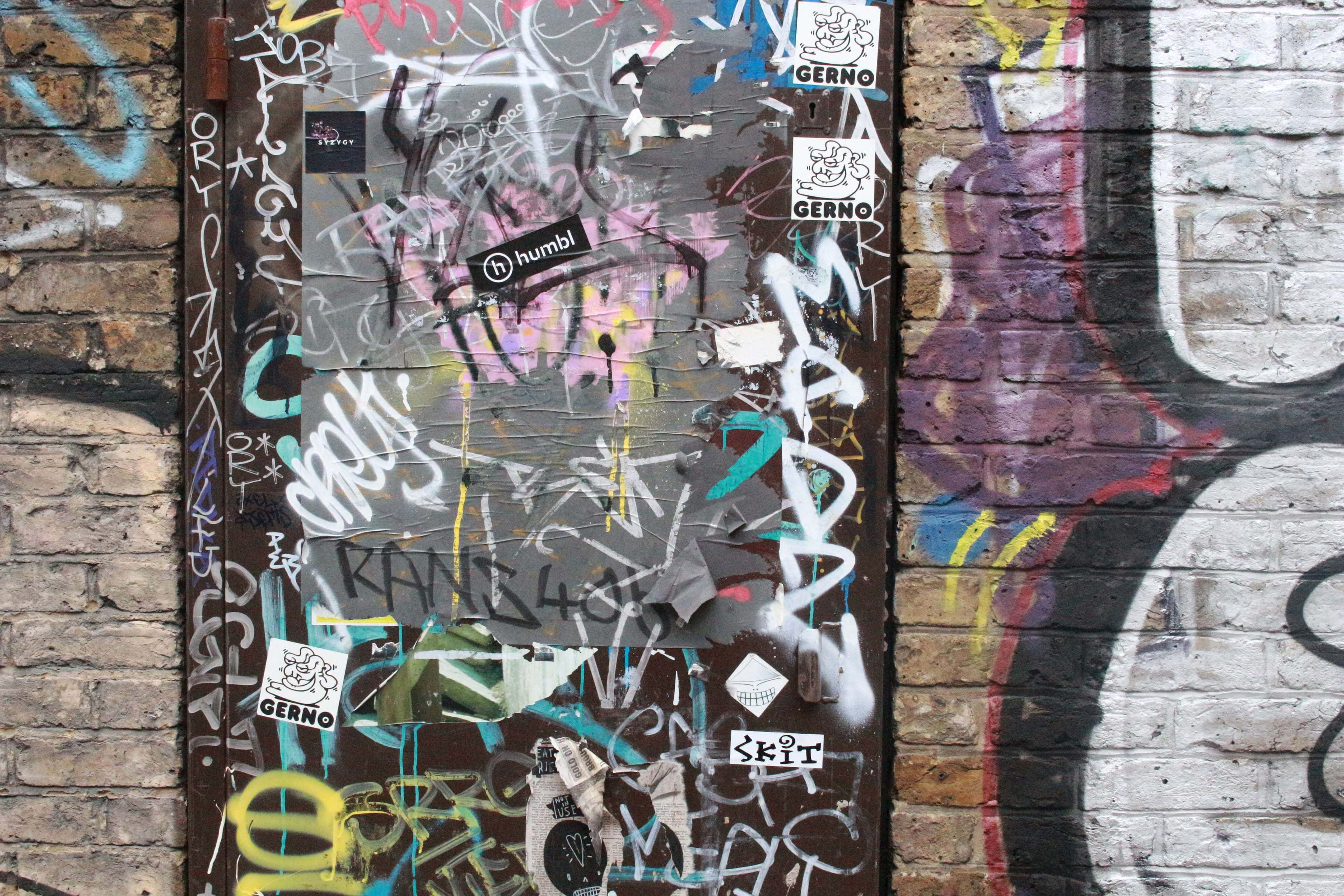 psychedelic 4K graffiti, weathered brick wall, layered graffiti tags, 4K Desktop Wallpaper