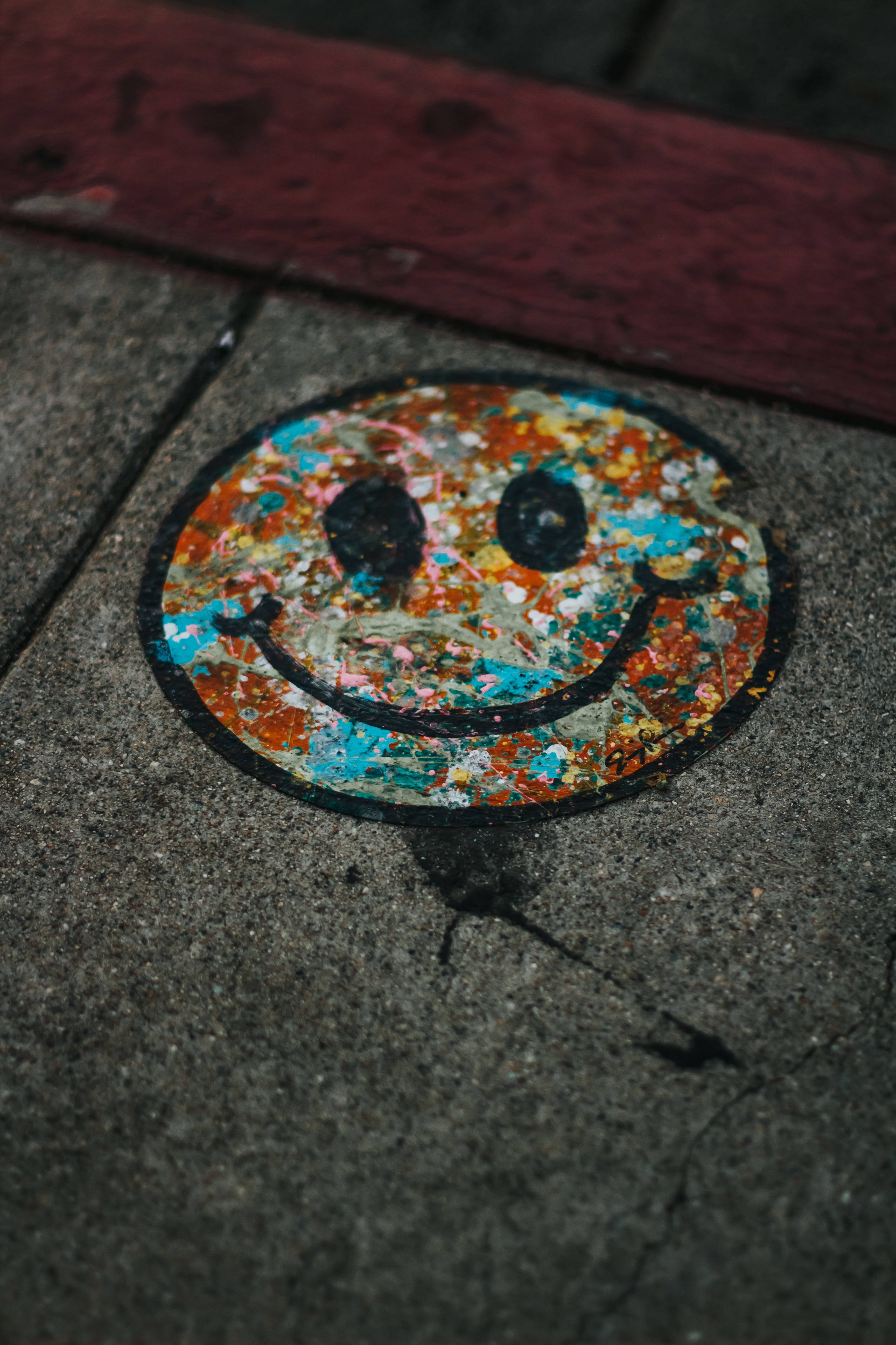 colorful smiley face, concrete sidewalk, red curb, 5K Phone Wallpaper