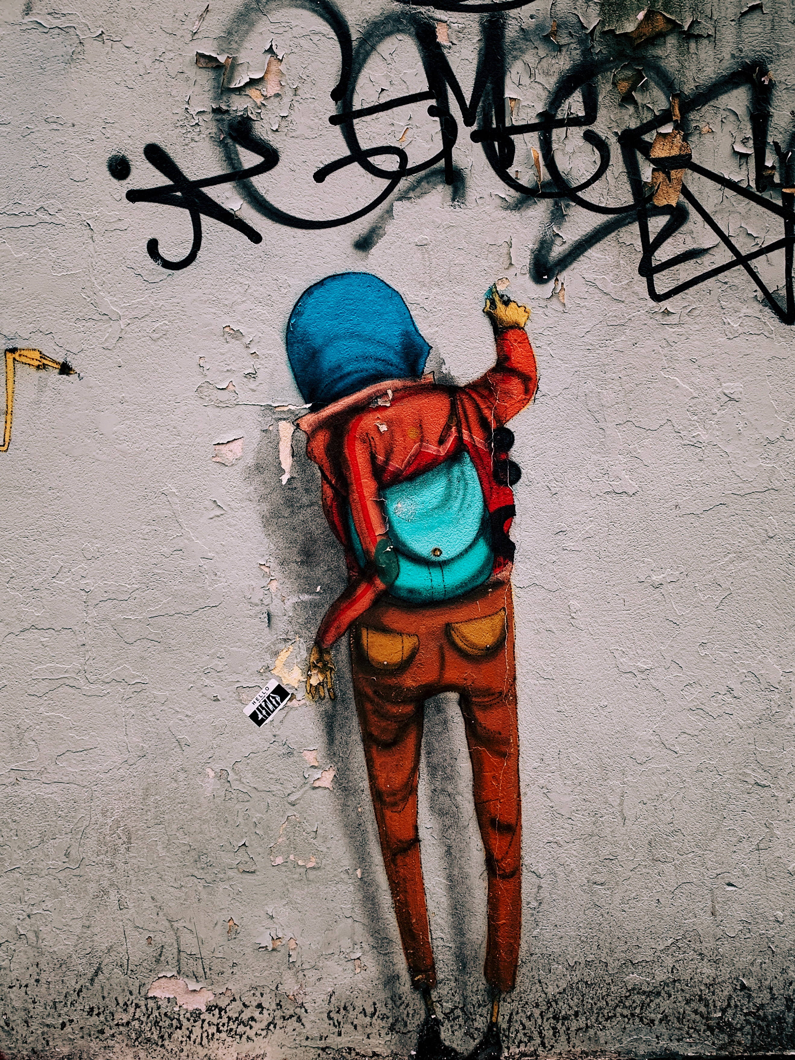 blue hood, red jacket, weathered gray wall, 2K Phone Wallpaper