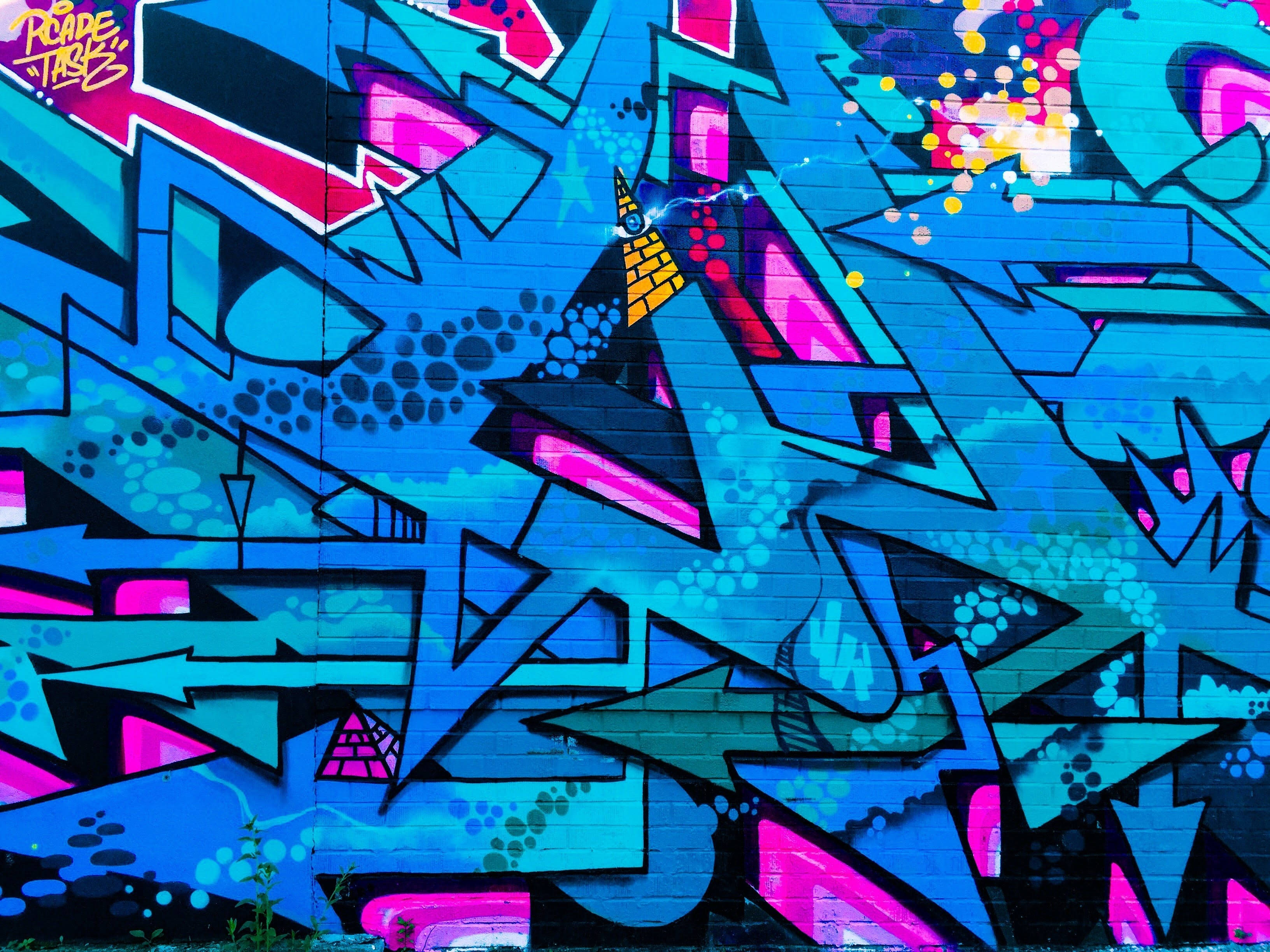 colorful graffiti art, brick wall, vibrant blue, 2K Desktop Wallpaper