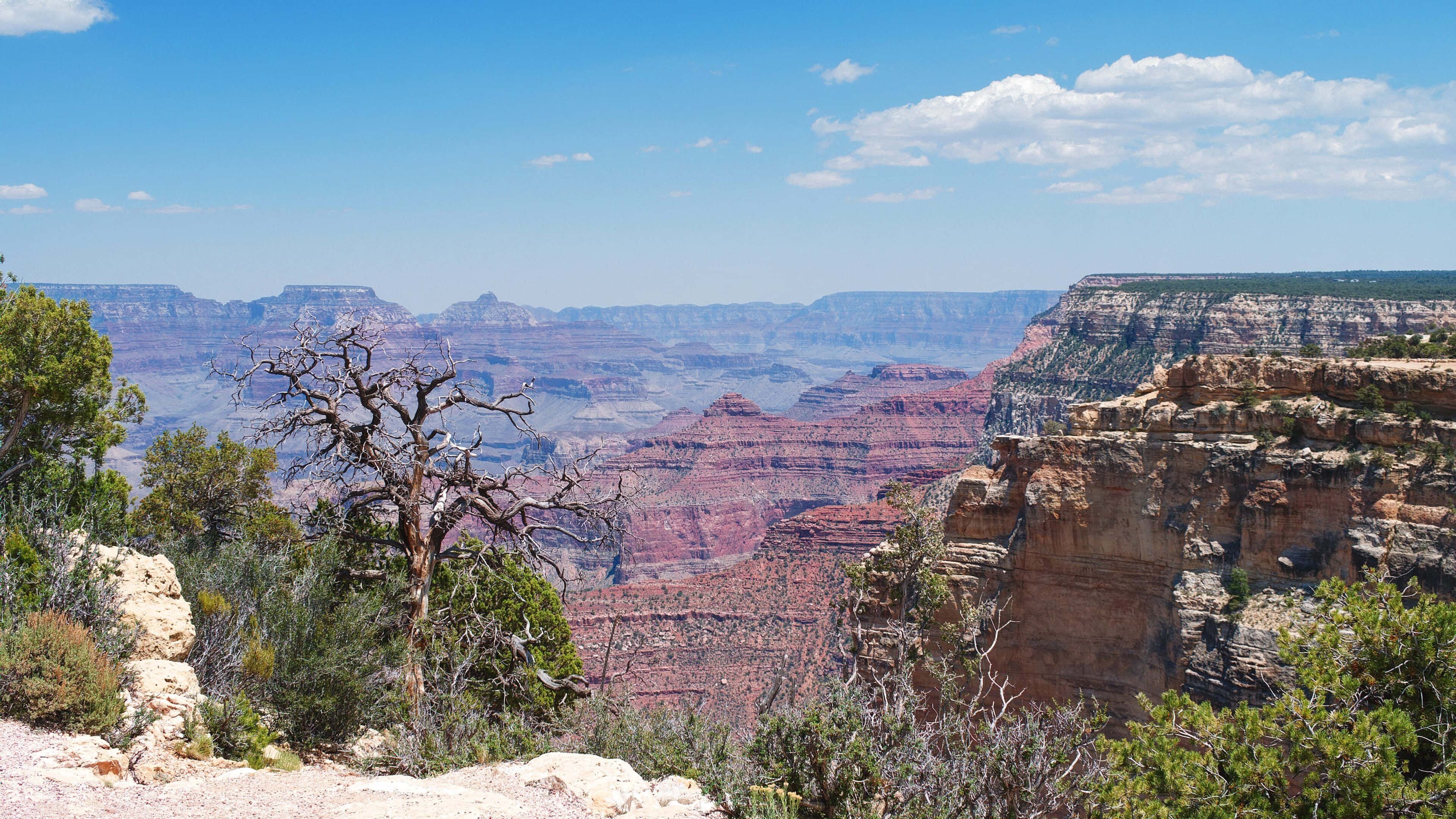 Grand canyon, red rock formations, bright blue sky, 4K Desktop Wallpaper