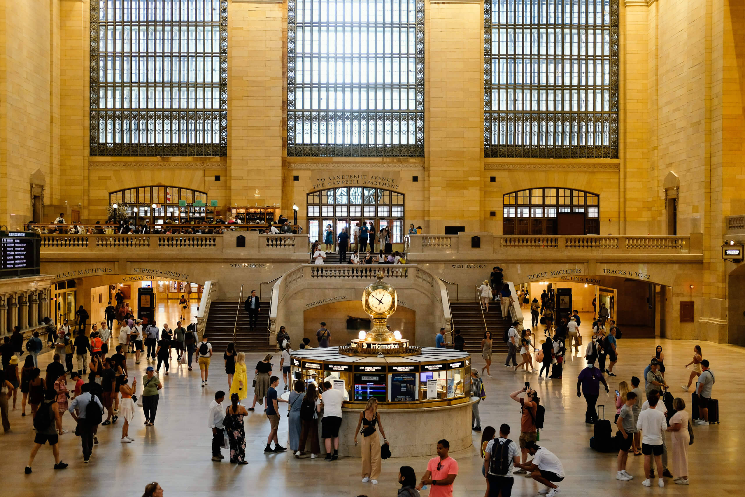Grand Central Station, high arched windows, golden light, 2K Desktop Wallpaper