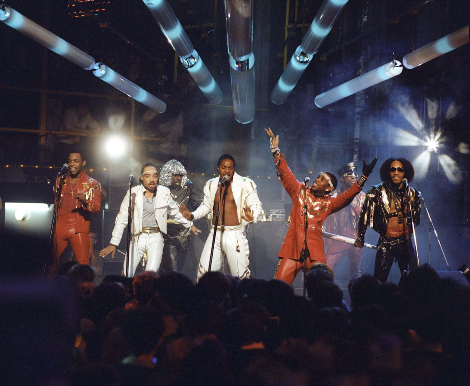 Grandmaster Flash And The Furious Five, shiny red and white outfits, dramatic stage lights, HD Desktop Wallpaper