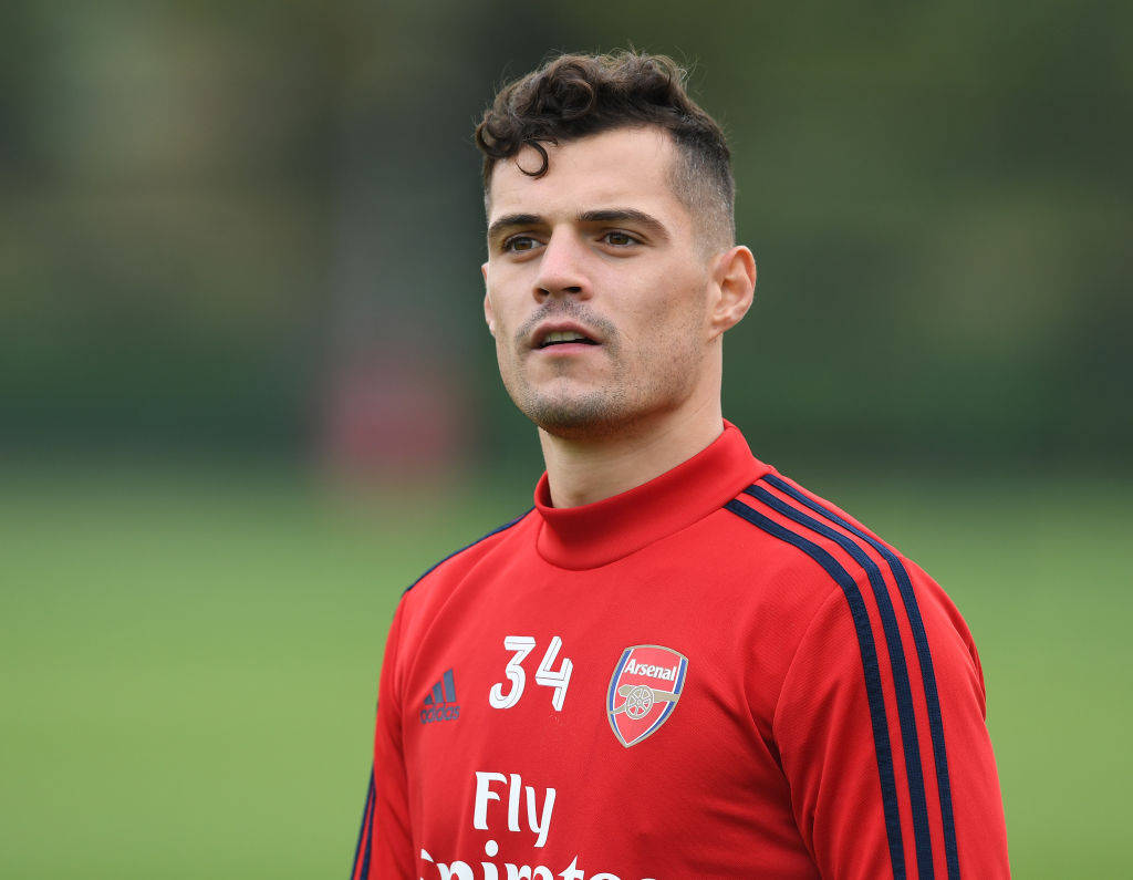 Granit Xhaka, red Arsenal training kit, green pitch, SD Desktop Wallpaper