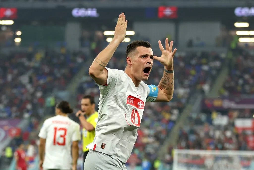 Granit Xhaka, white jersey, packed stadium, SD Desktop Wallpaper