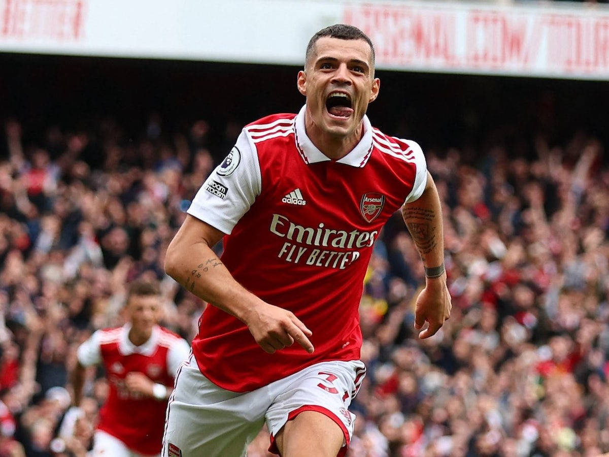 Granit Xhaka, red Arsenal jersey, stadium, SD Desktop Wallpaper