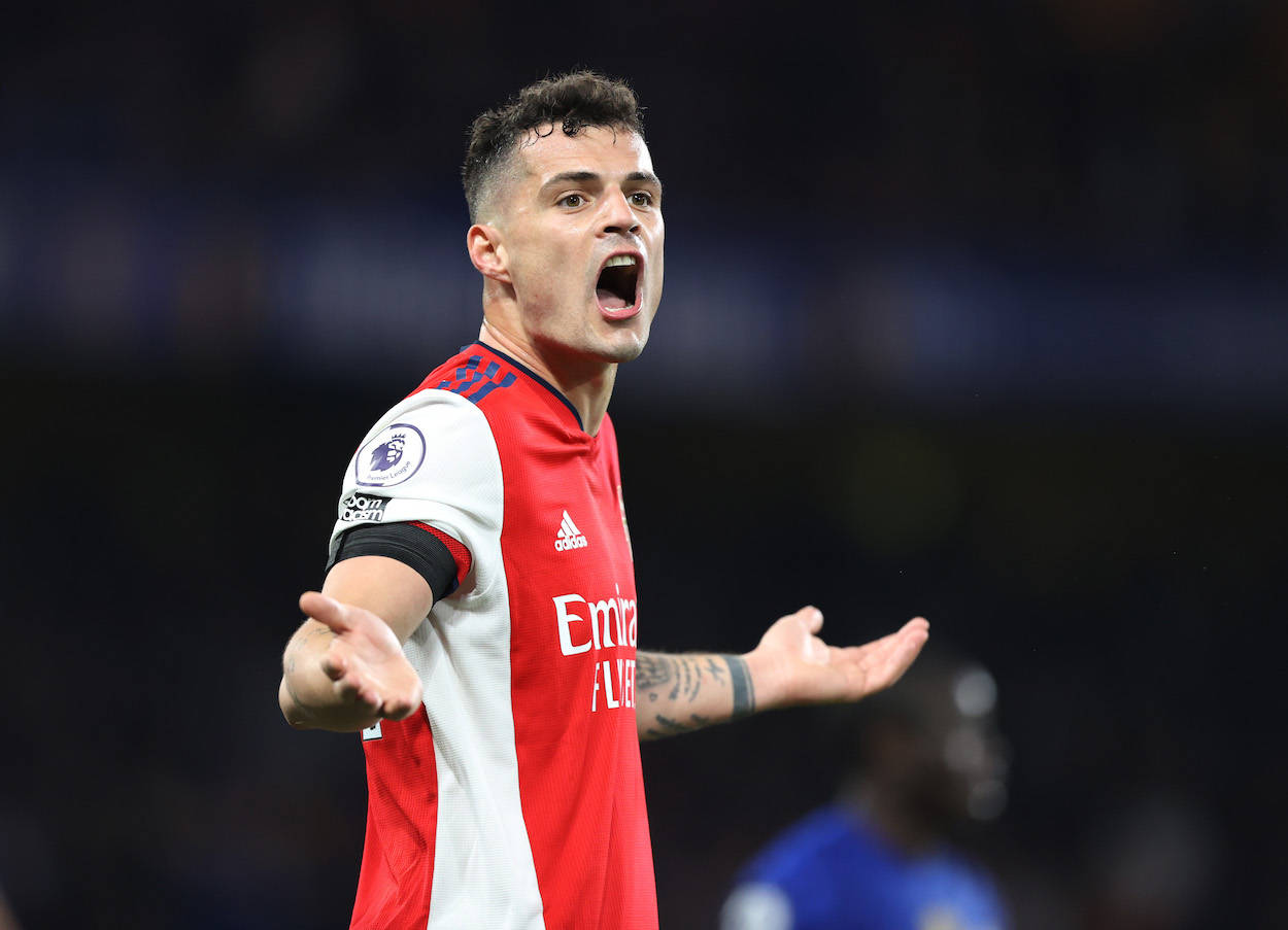 Granit Xhaka, red and white jersey, stadium lights, SD Desktop Wallpaper