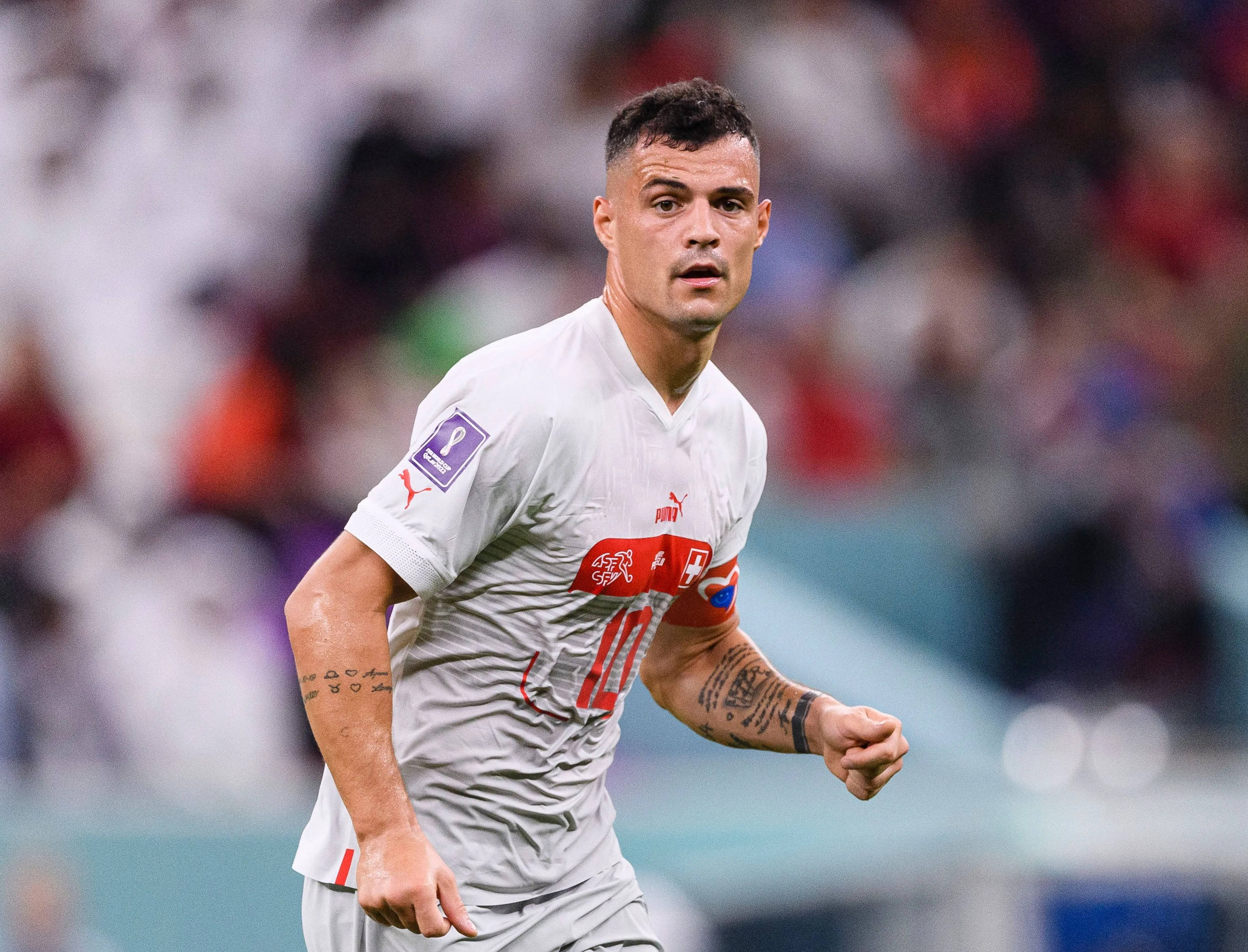 Granit Xhaka, white jersey, red accents, 2K Desktop Wallpaper