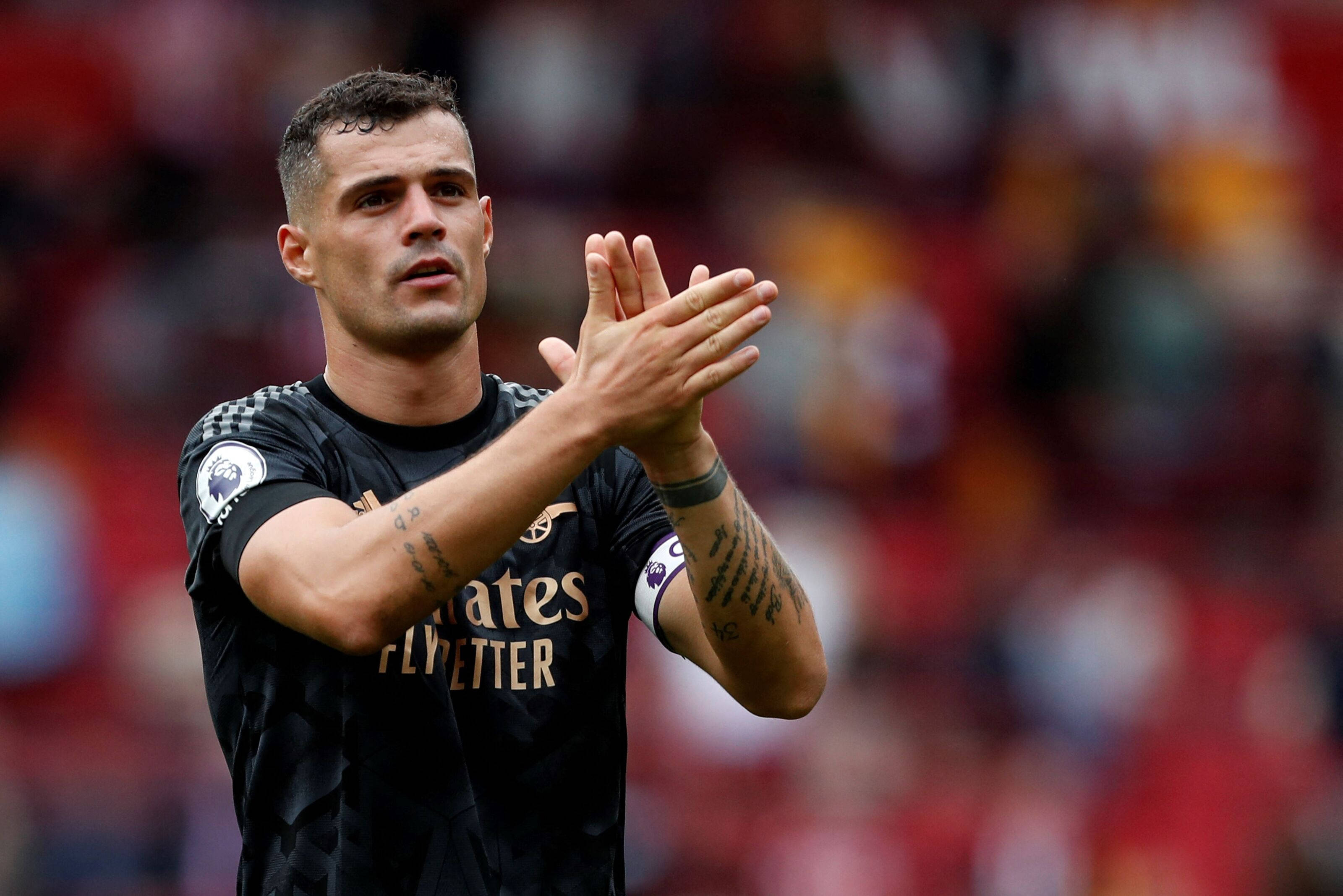 Granit Xhaka, black jersey, pitch, 2K Desktop Wallpaper