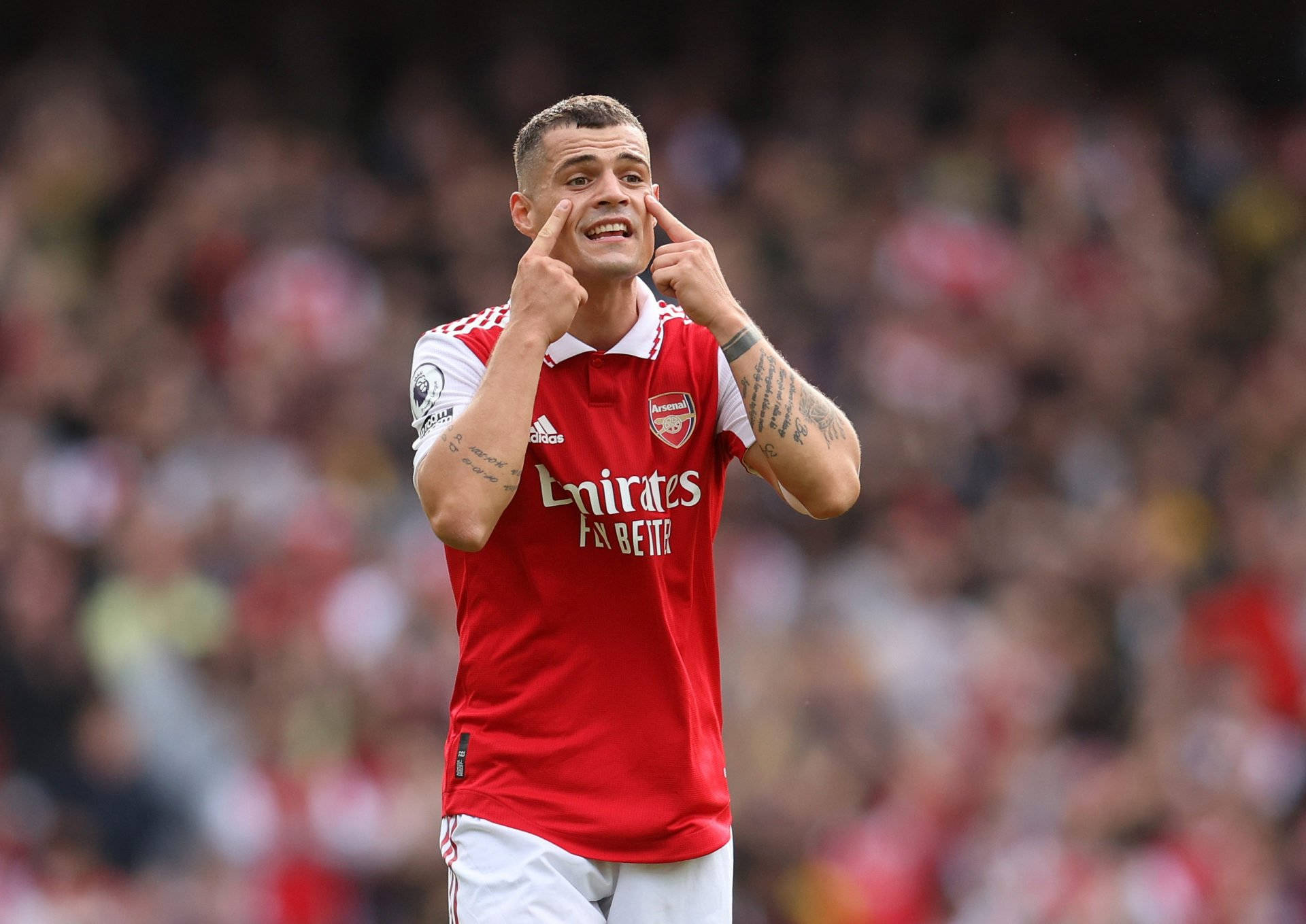Granit Xhaka, red Arsenal jersey, stadium crowd, Full HD Desktop Wallpaper