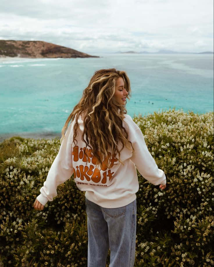 coastal granola aesthetic woman, cliffside, turquoise waters, SD Phone Wallpaper