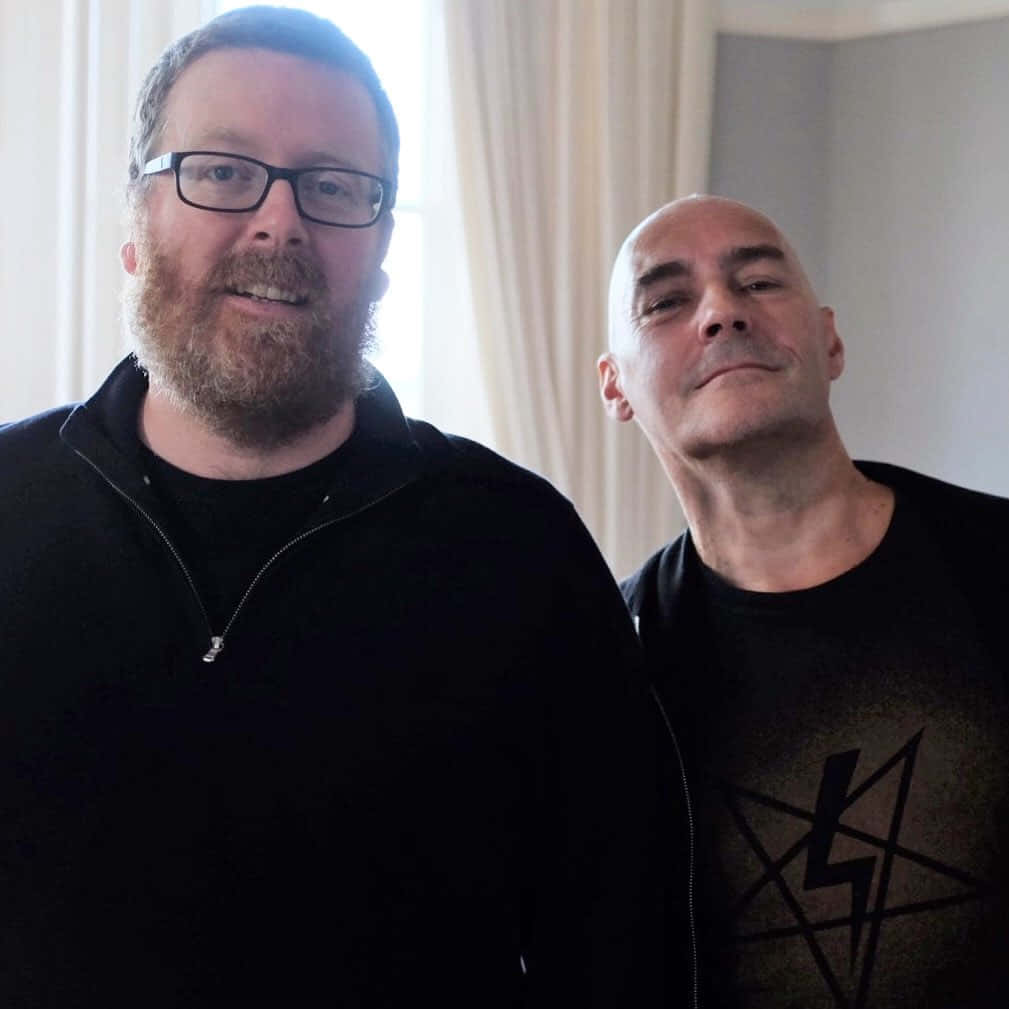 Grant Morrison, black clothing, glasses, SD Desktop Wallpaper