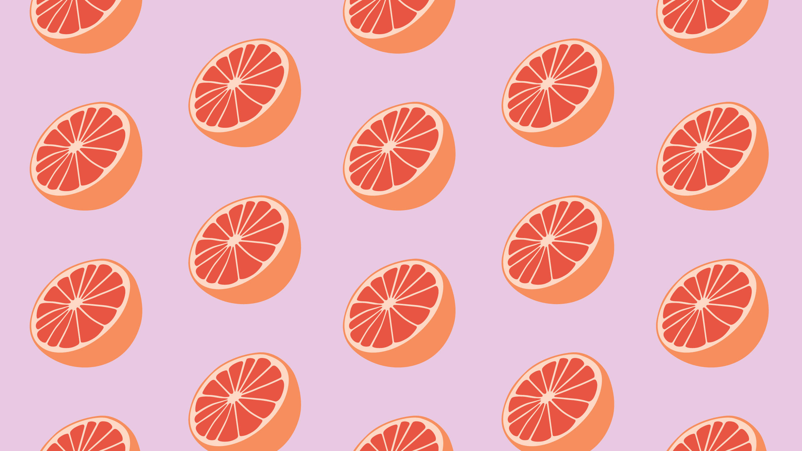 sliced grapefruits, vibrant orange, pink hues, 2K Desktop Wallpaper