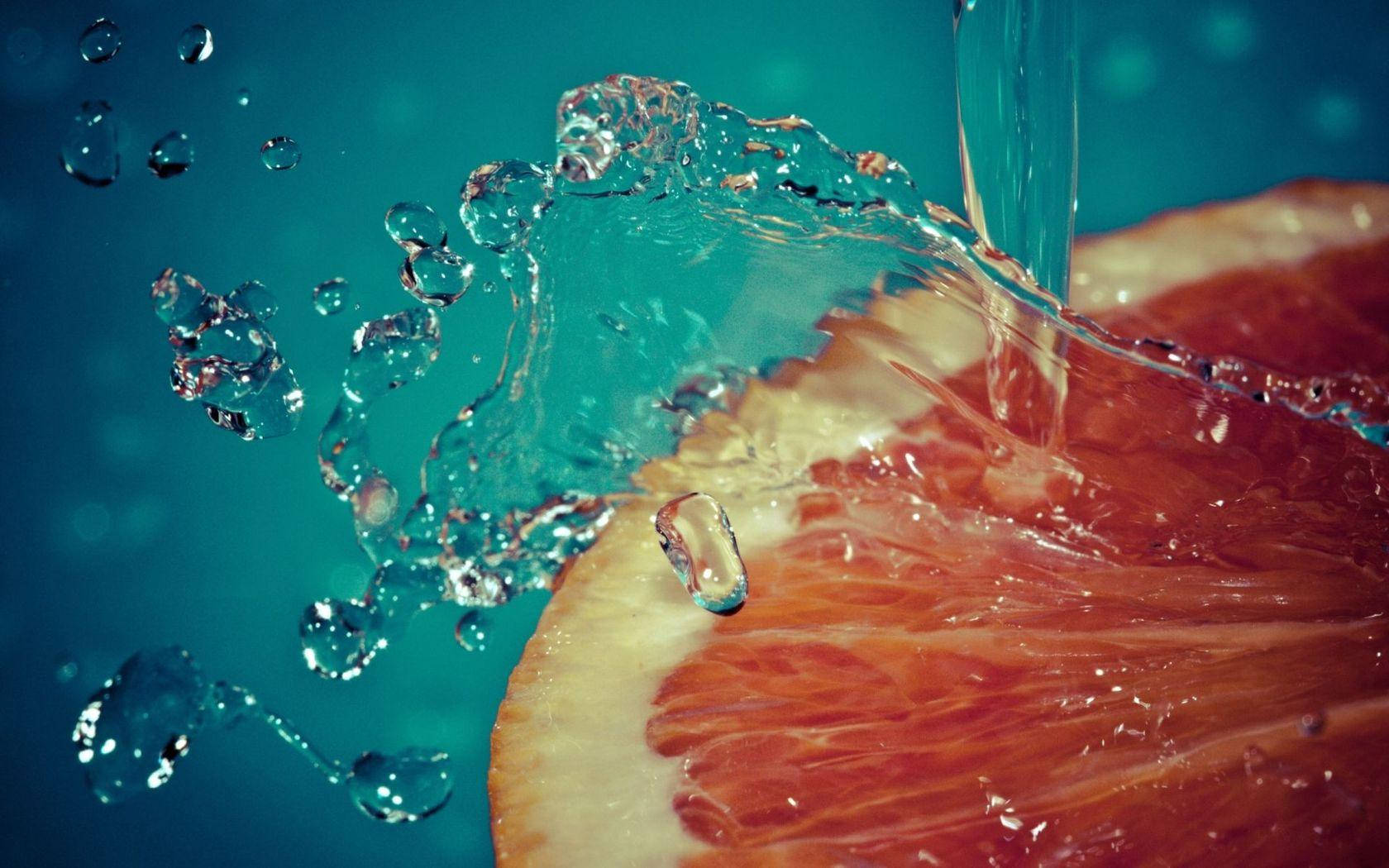sliced grapefruit, water splash, teal background, HD Desktop Wallpaper