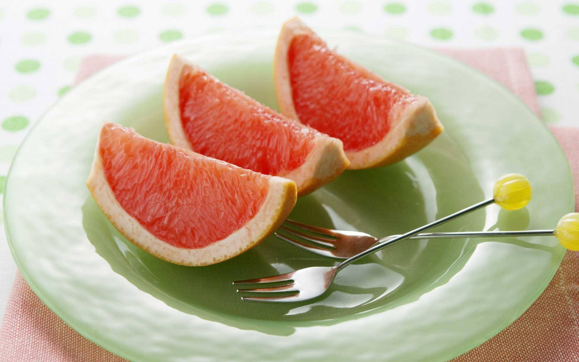 sliced grapefruits, green plate, two forks, Full HD Desktop Wallpaper