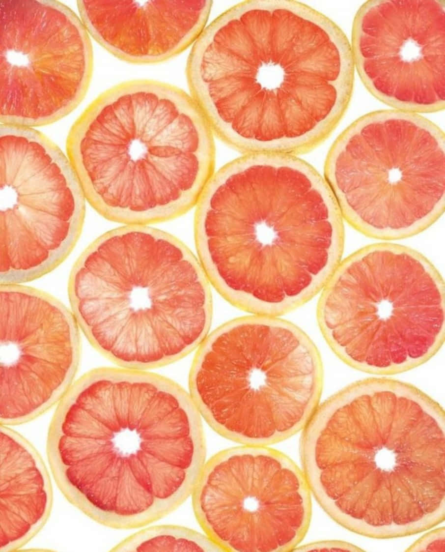 pink grapefruit, sliced grapefruits, vibrant circular pattern, SD Phone Wallpaper