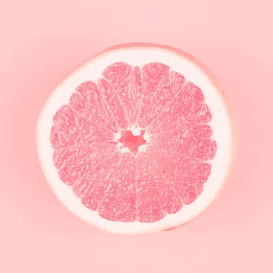 pink grapefruit, juicy segments, soft pastel pink background, SD Desktop Wallpaper