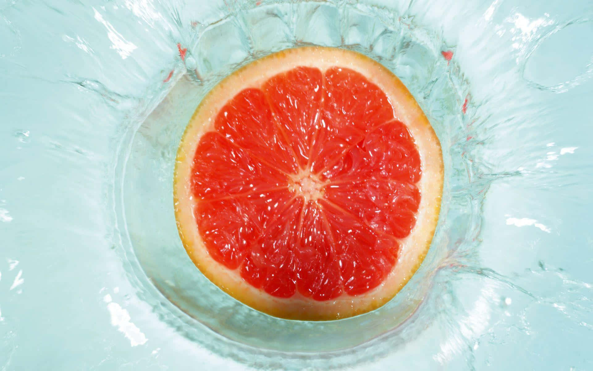 pink grapefruit, red grapefruit slice, clear water, Full HD Desktop Wallpaper