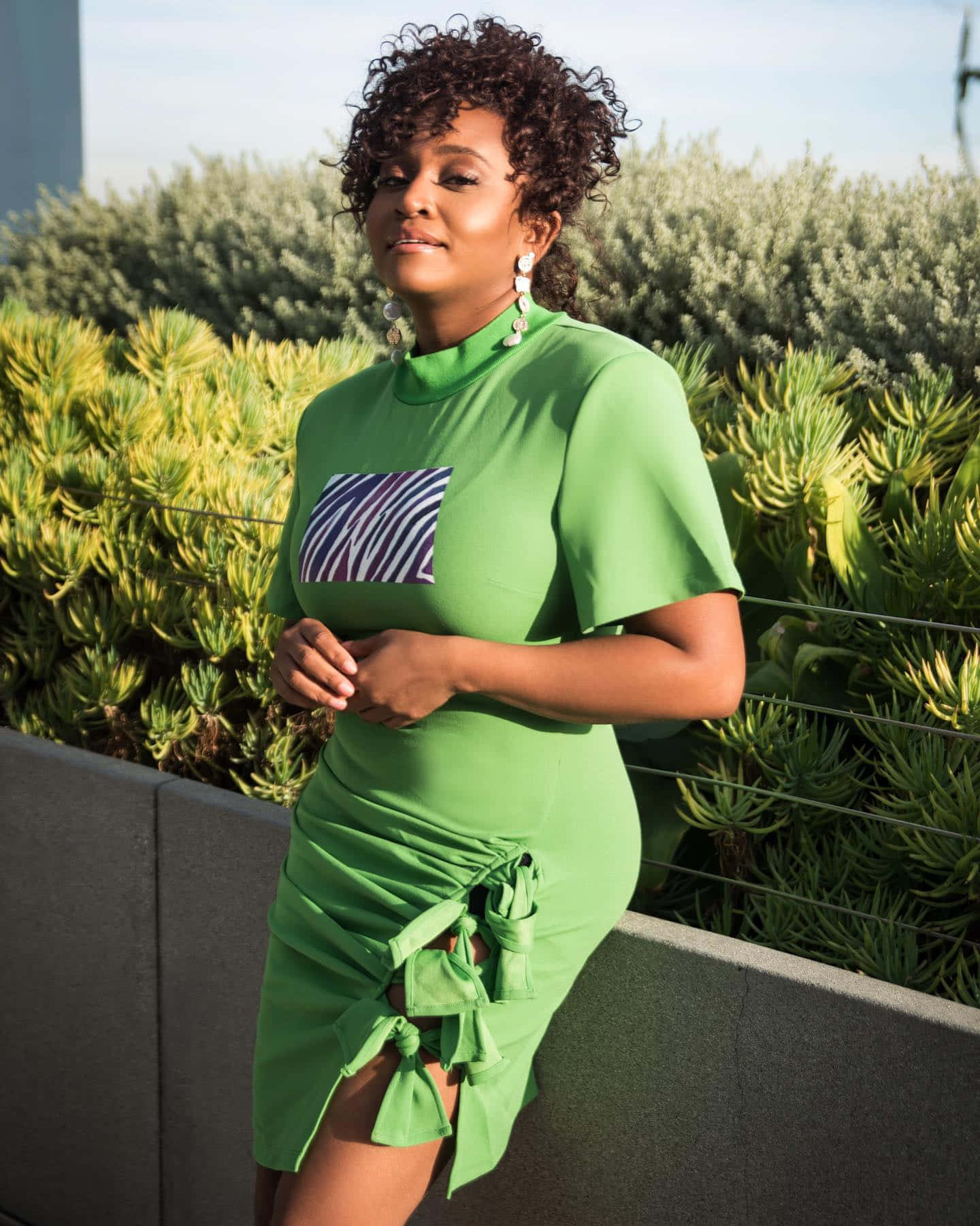 vibrant green dress, geometric chest panel, concrete wall, HD Phone Wallpaper