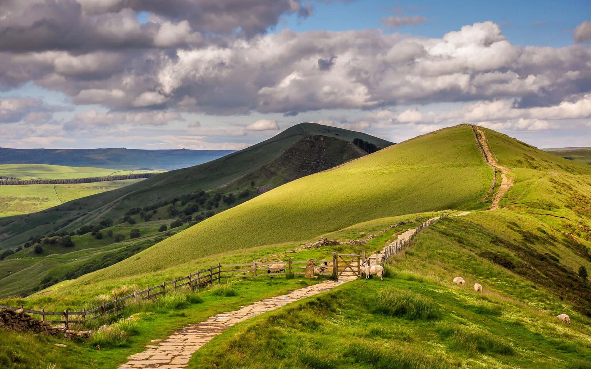 Green Hillside Country Road, vibrant green hills, dramatic cloudy sky, Full HD Desktop Wallpaper