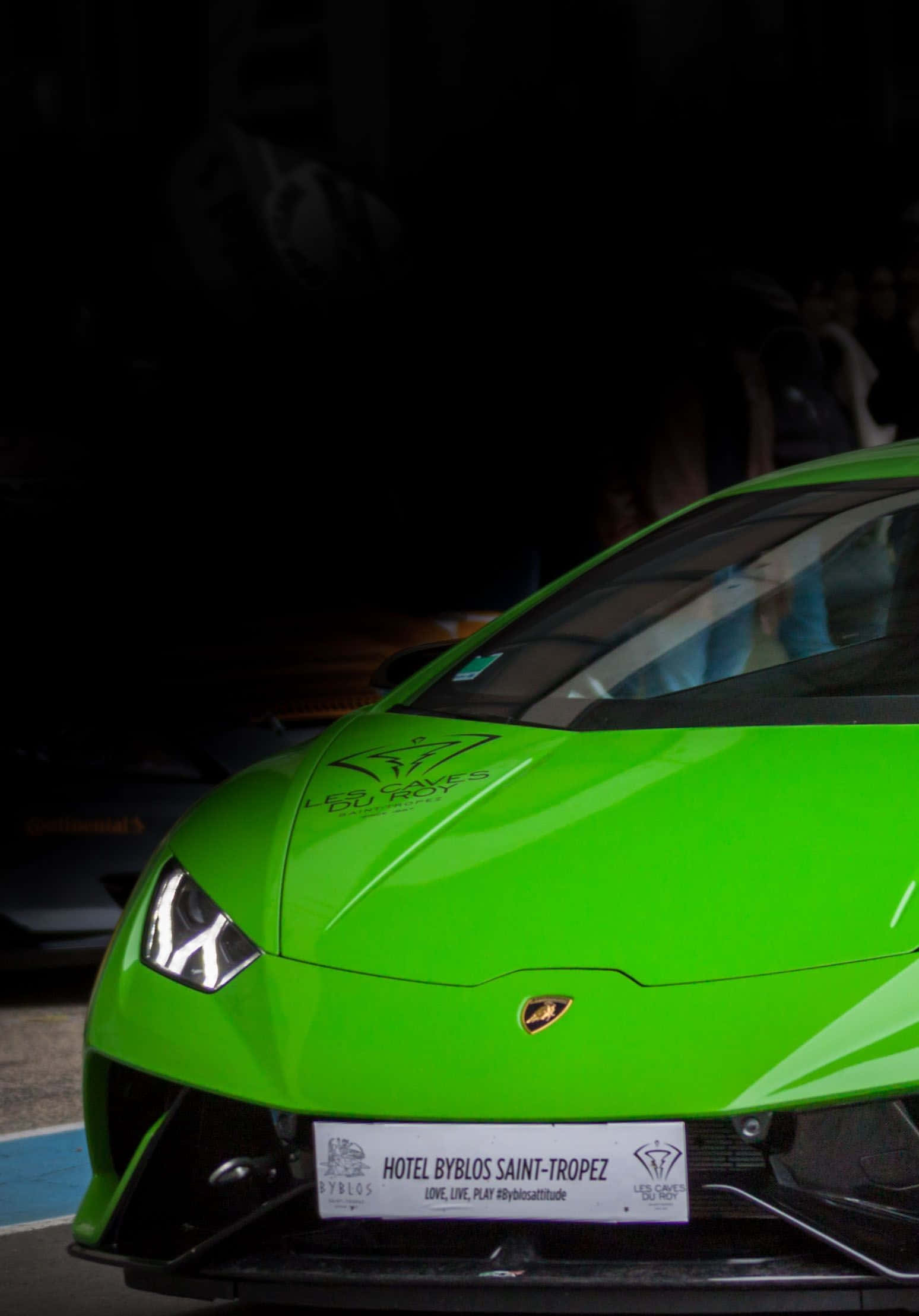 green Lamborghini, sports car, nighttime event, Full HD Phone Wallpaper