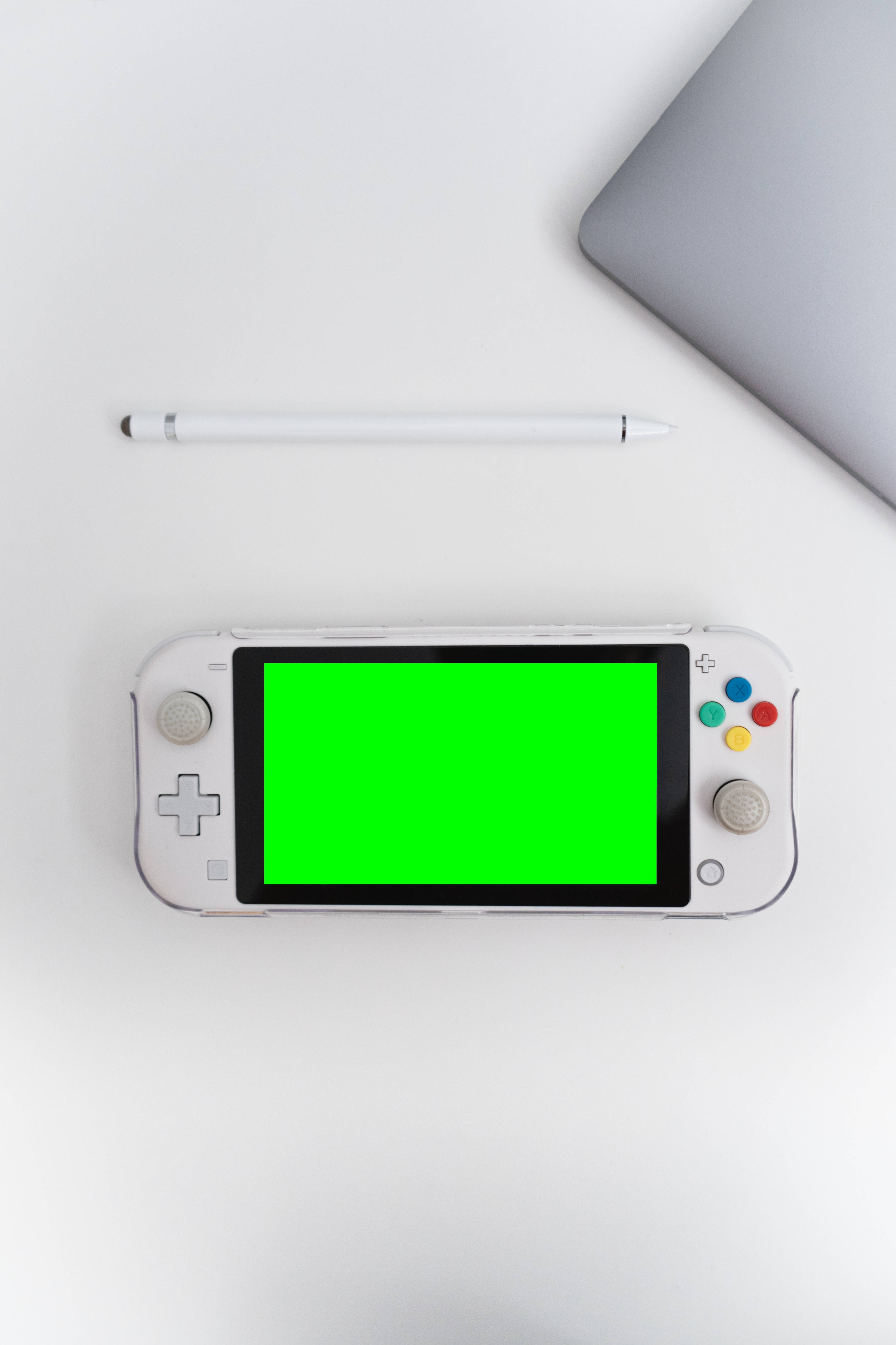 white handheld gaming console, green screen, laptop, 5K Phone Wallpaper